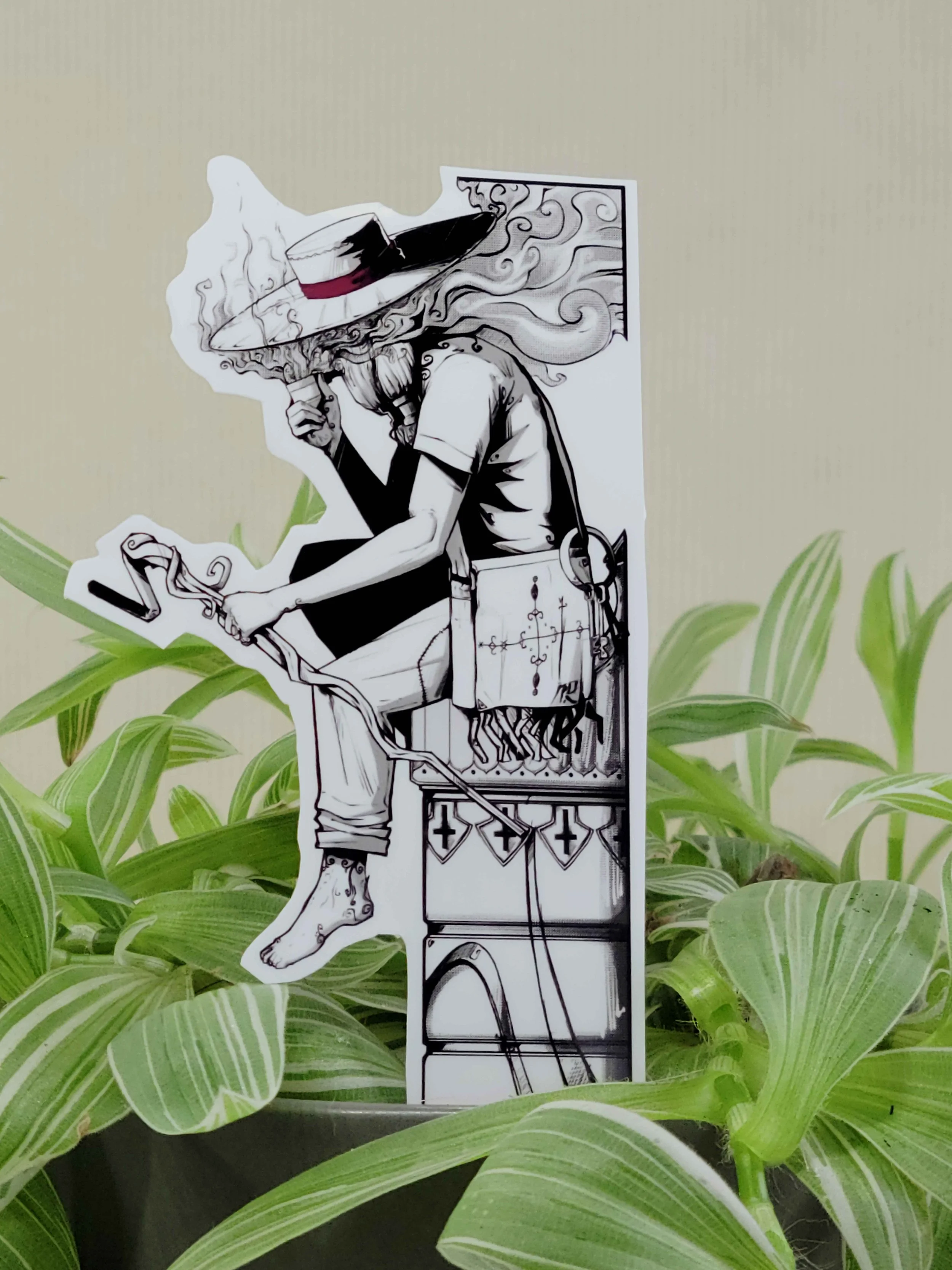 Legba on gate in plant.jpg