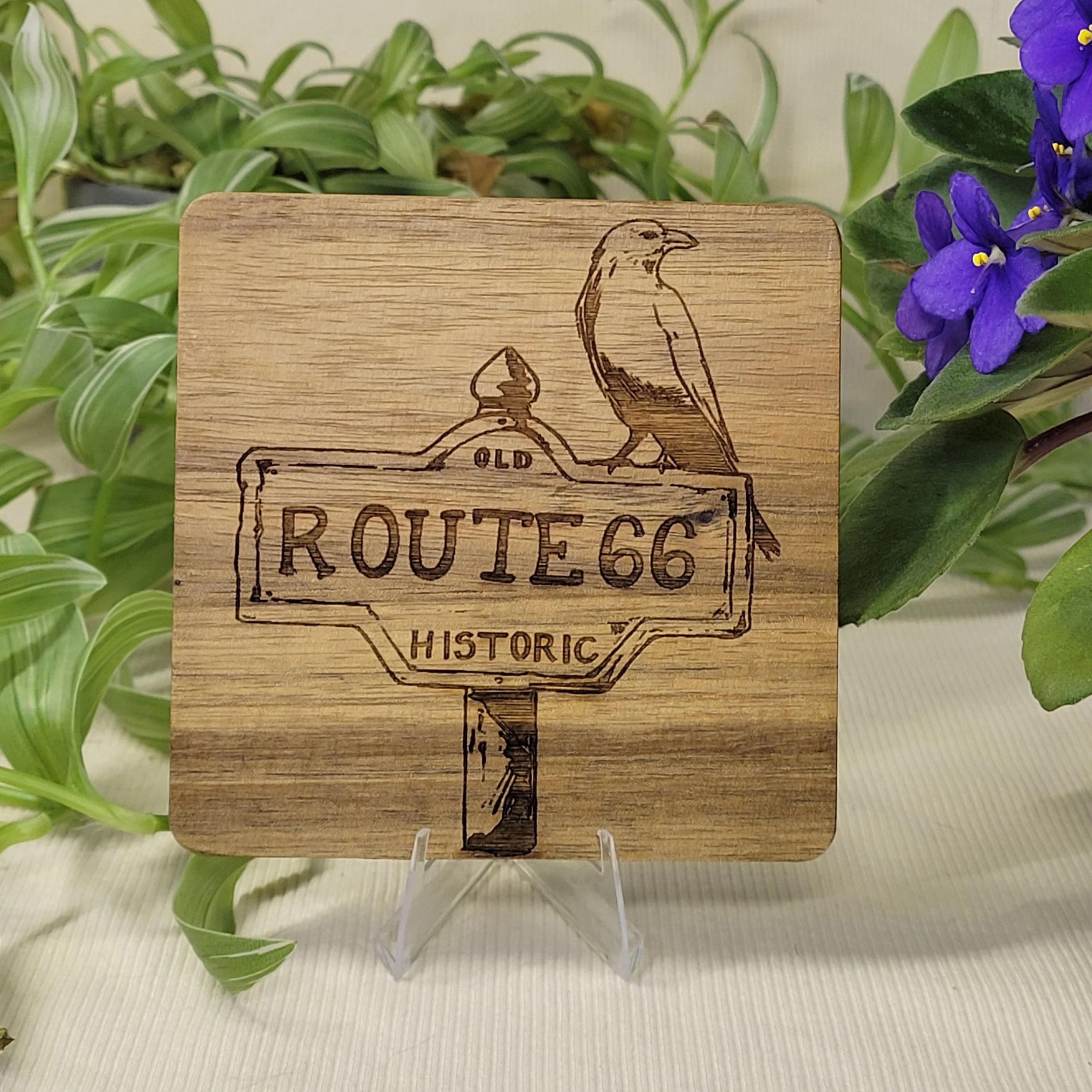 Crow on old route 66 sign coaster