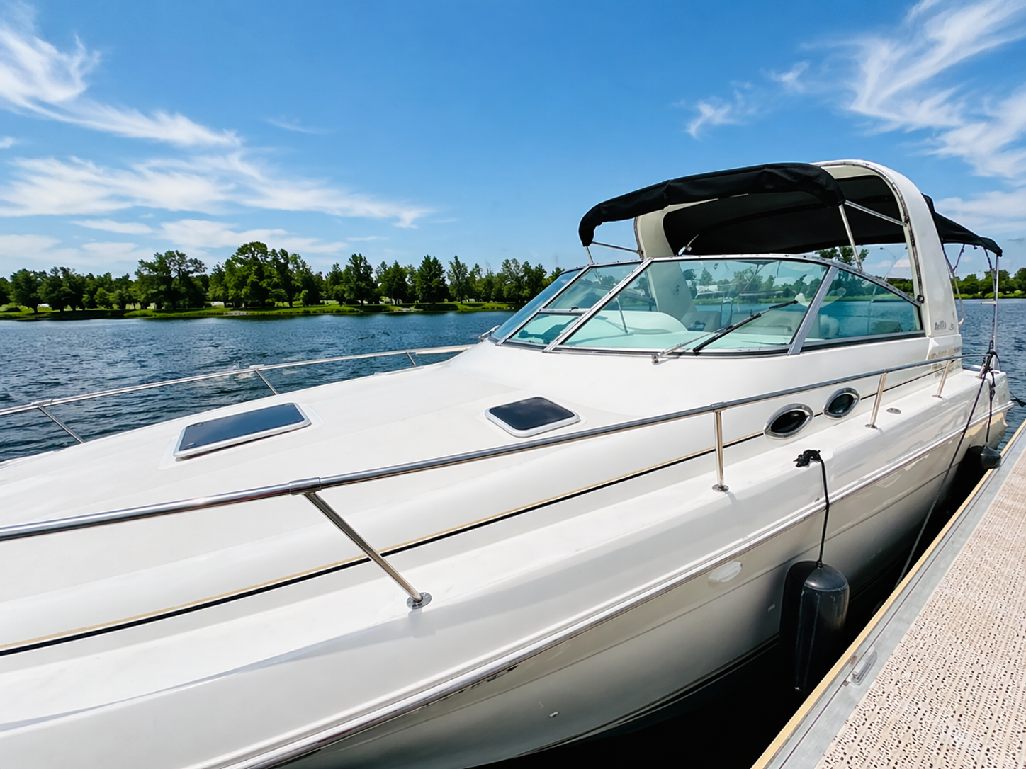 luxury-motor-yacht-side-profile-docked-marina-waterfront.jpg