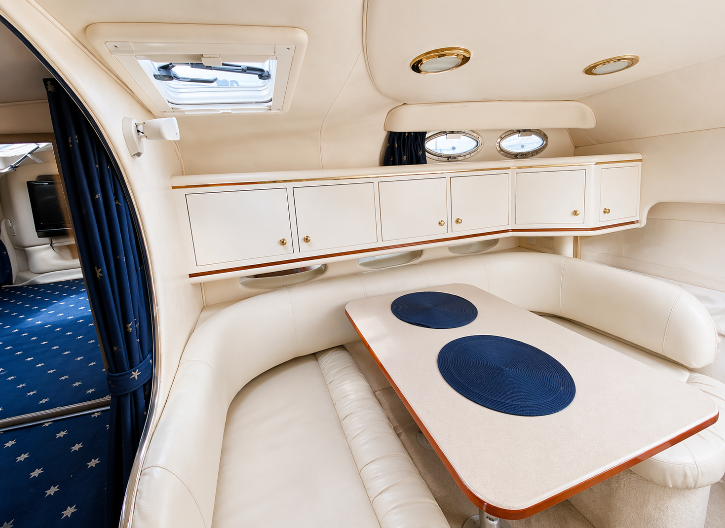 luxury-yacht-interior-dining-seating-cabin-modern-boat.jpg