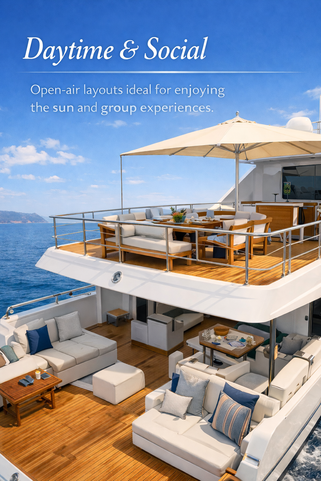 The image shows the outdoor deck of a yacht with seating arrangements, a dining table, large umbrellas, and a scenic ocean view with mountains in the background.