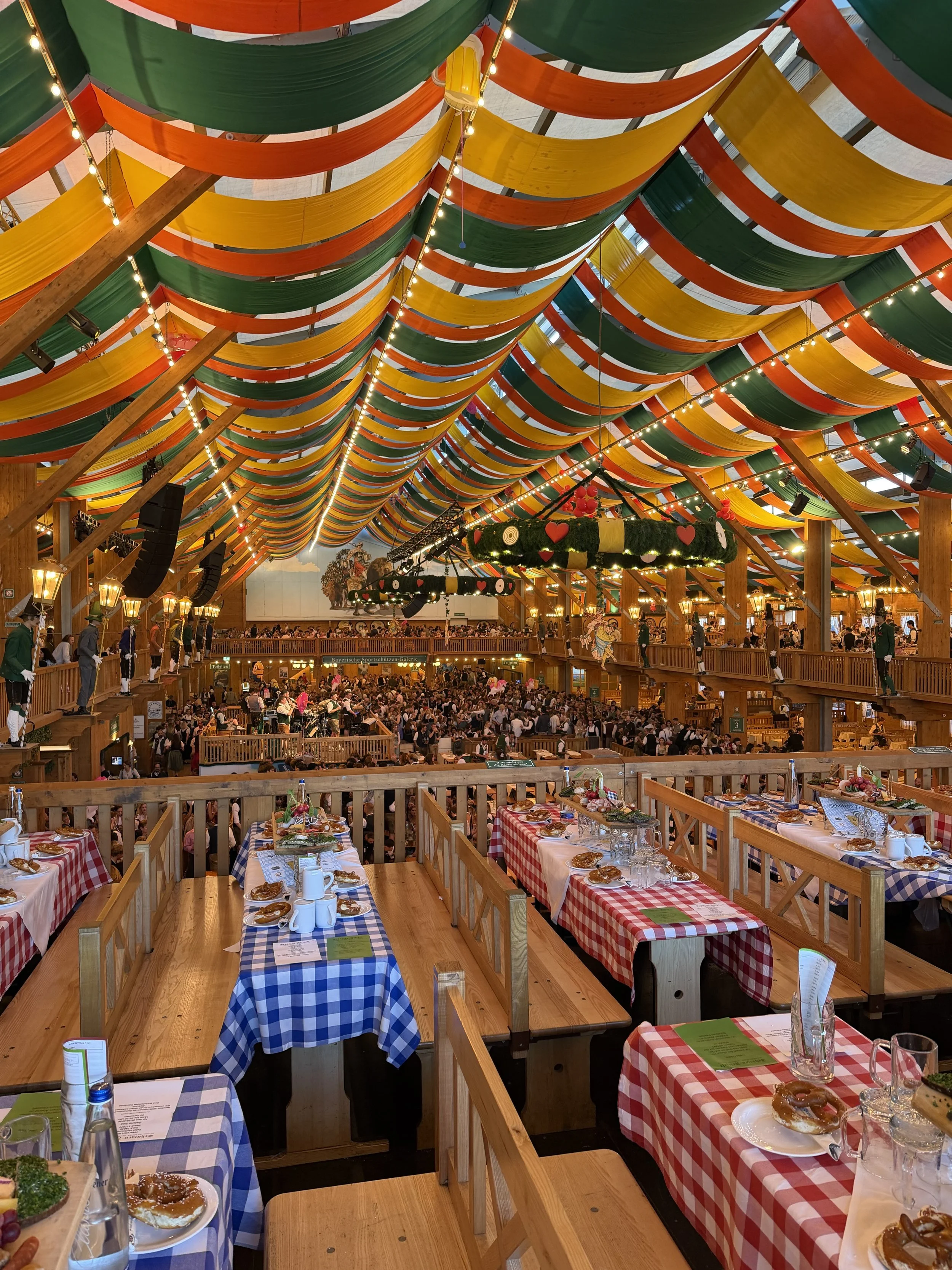 tables in a tent decorated for Bavarian Oktoberfest Beer Festival