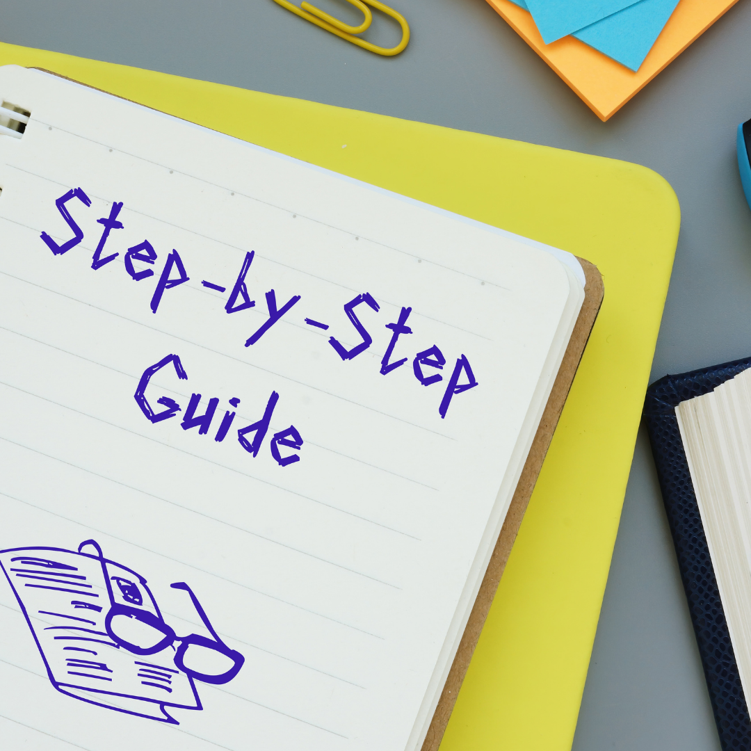 Notebook page with the handwritten title 'Step-by-Step Guide' and a sketch of glasses resting on a book, surrounded by stationery items like paperclips, sticky notes, and a pen.