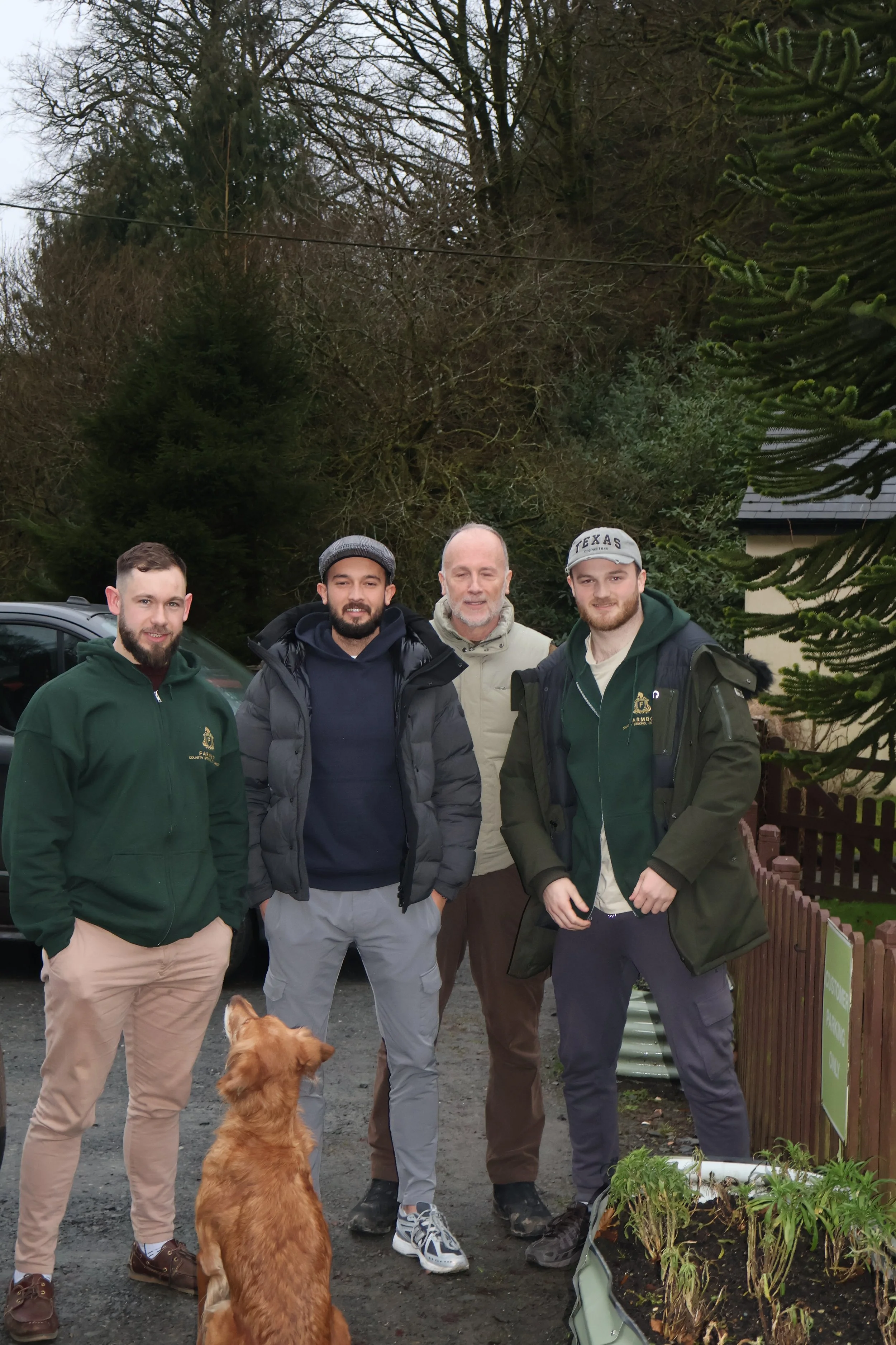 Henry, Ben, Jason, and Fred pose for a good bye photo with Gin