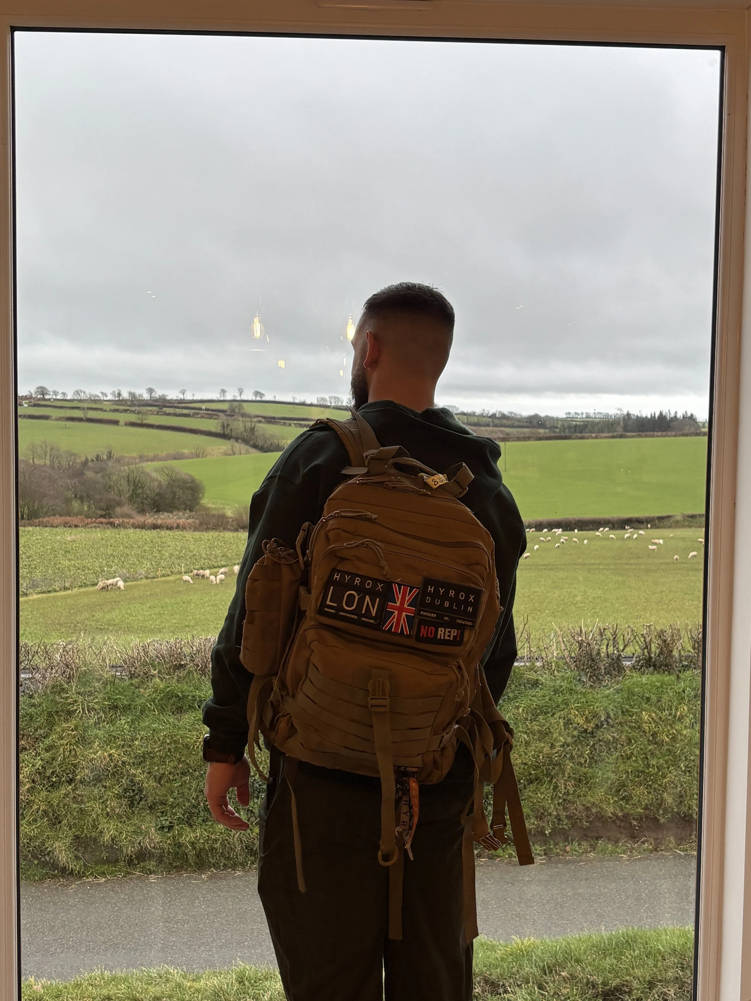 Farm Boi Henry admires the sweeping views at the house