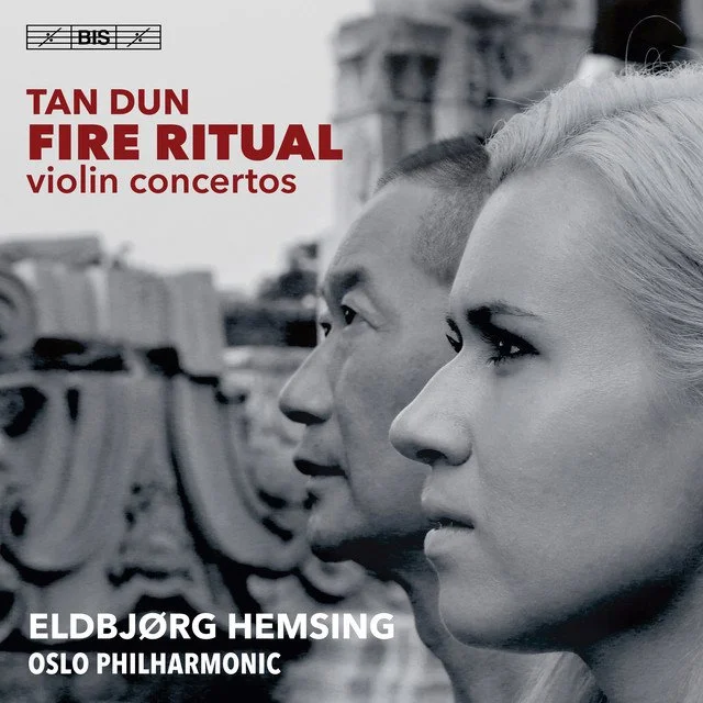 Black and white cover of a music album featuring two people in profile, with the text 'TAN DUN FIRE RITUAL violin concertos,' 'ELDBJØRG HEMSING,' and 'OSLO PHILHARMONIC.'