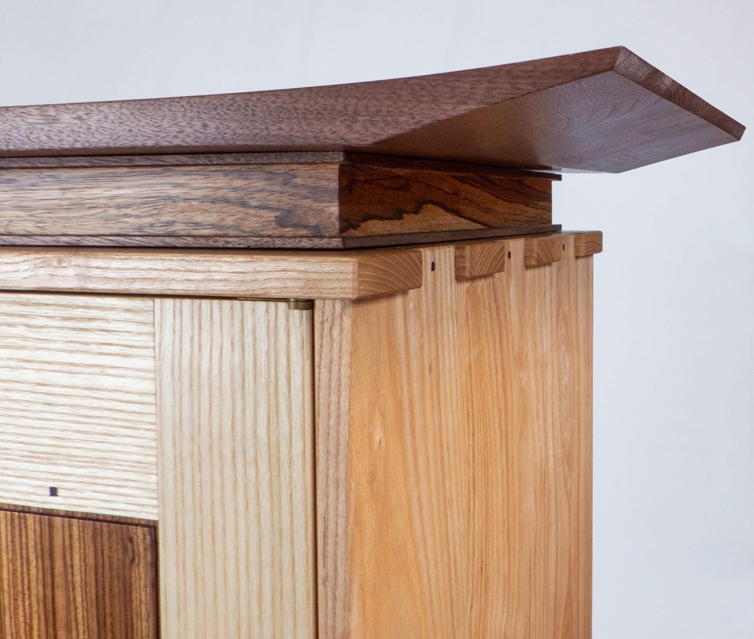 Cabinet-on-stand-zebrawood-top-detail.jpg