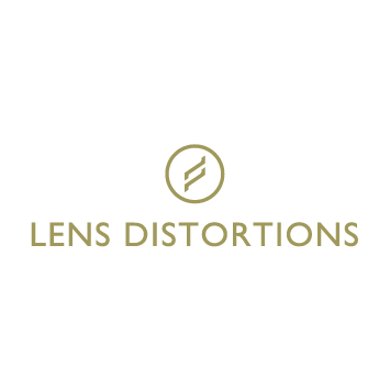 Logo with a circle and slash symbol above the words 'Lens Distortions'.