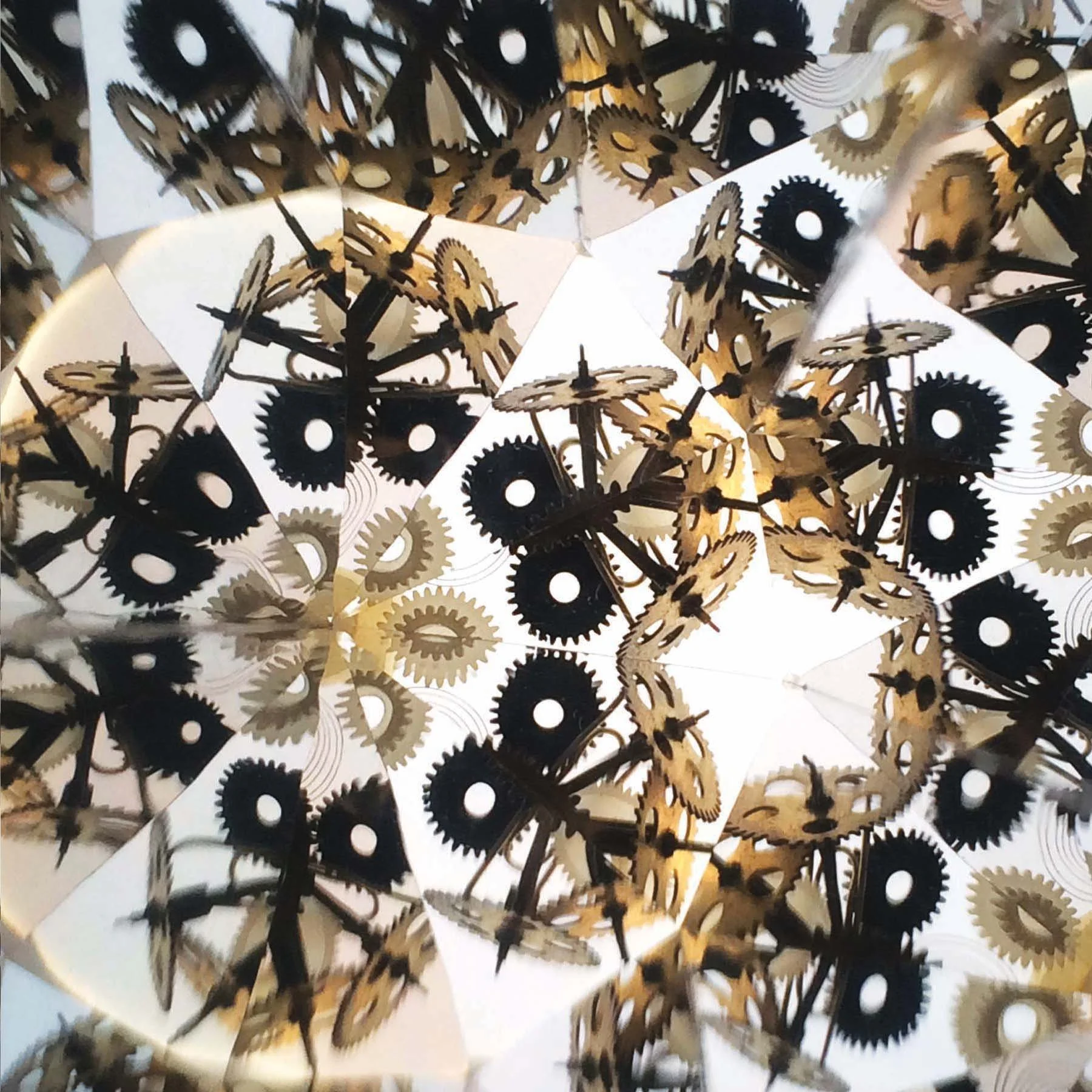 Symmetrical clockwork mosaic featuring metallic gears and springs.