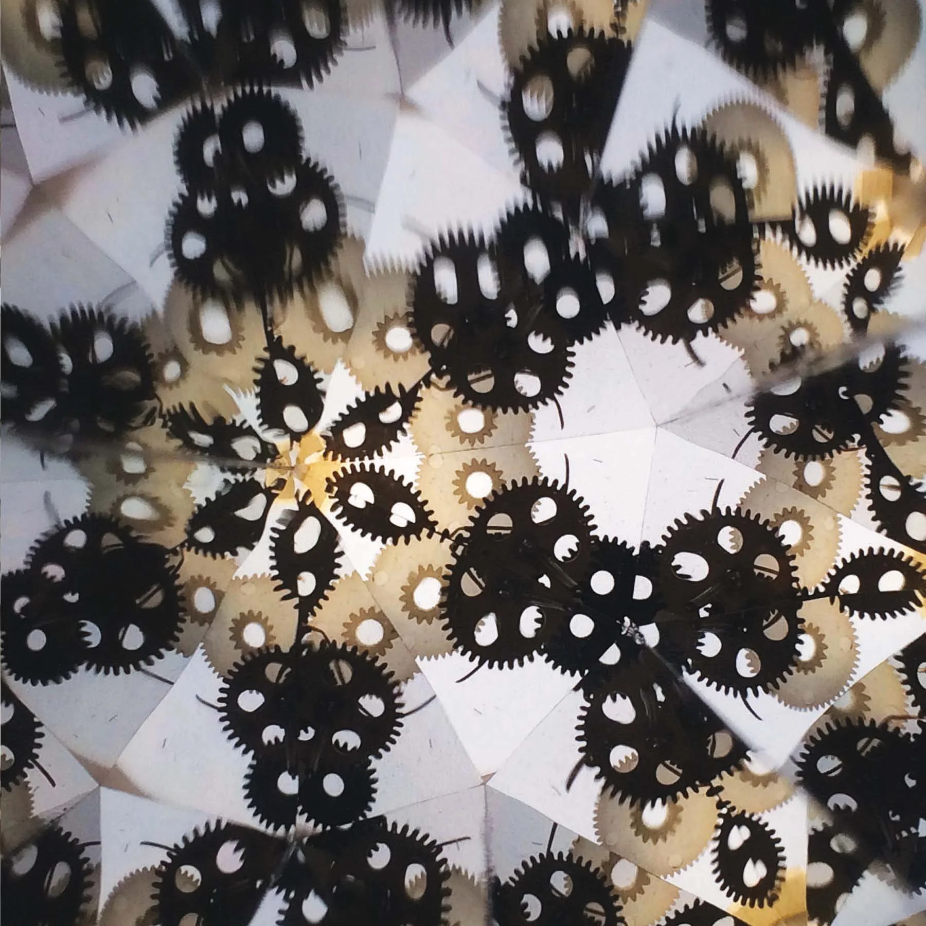 Industrial art: kaleidoscope view of intricate steampunk watch parts.