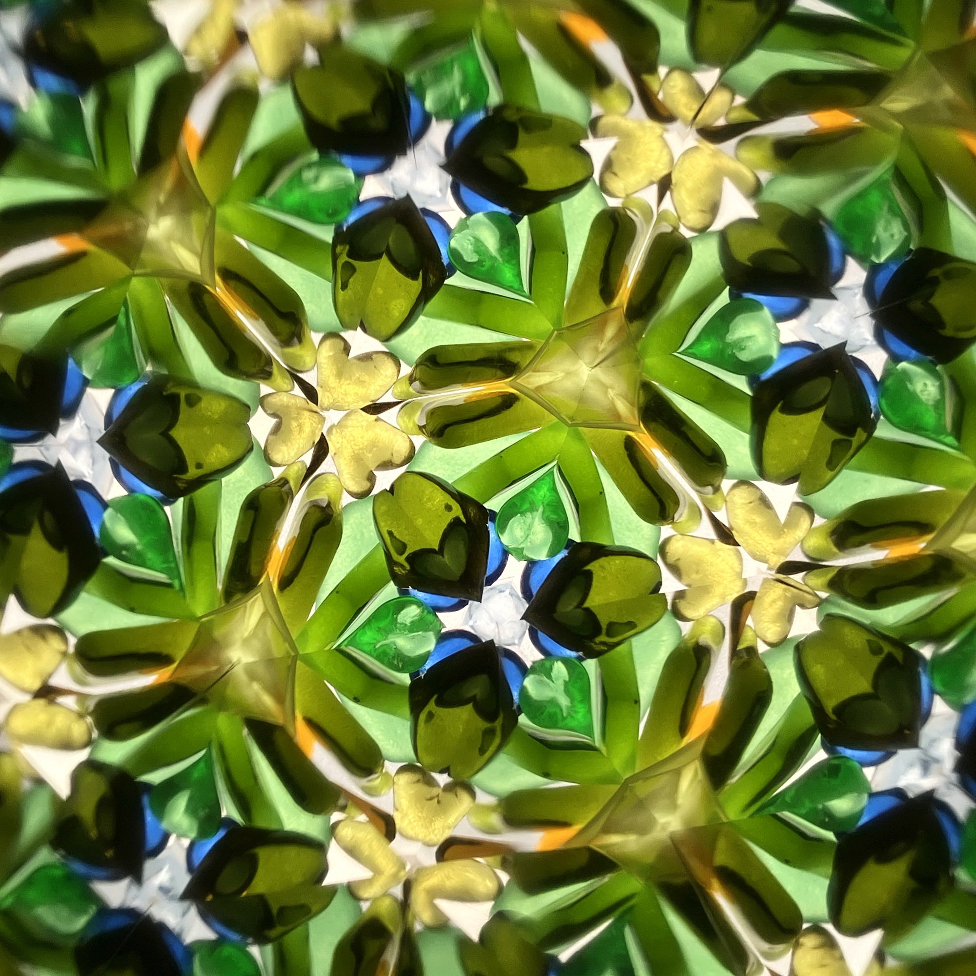  Vibrant lime green and golden amber kaleidoscope design reflecting traditional St. Patrick's Day colors. 