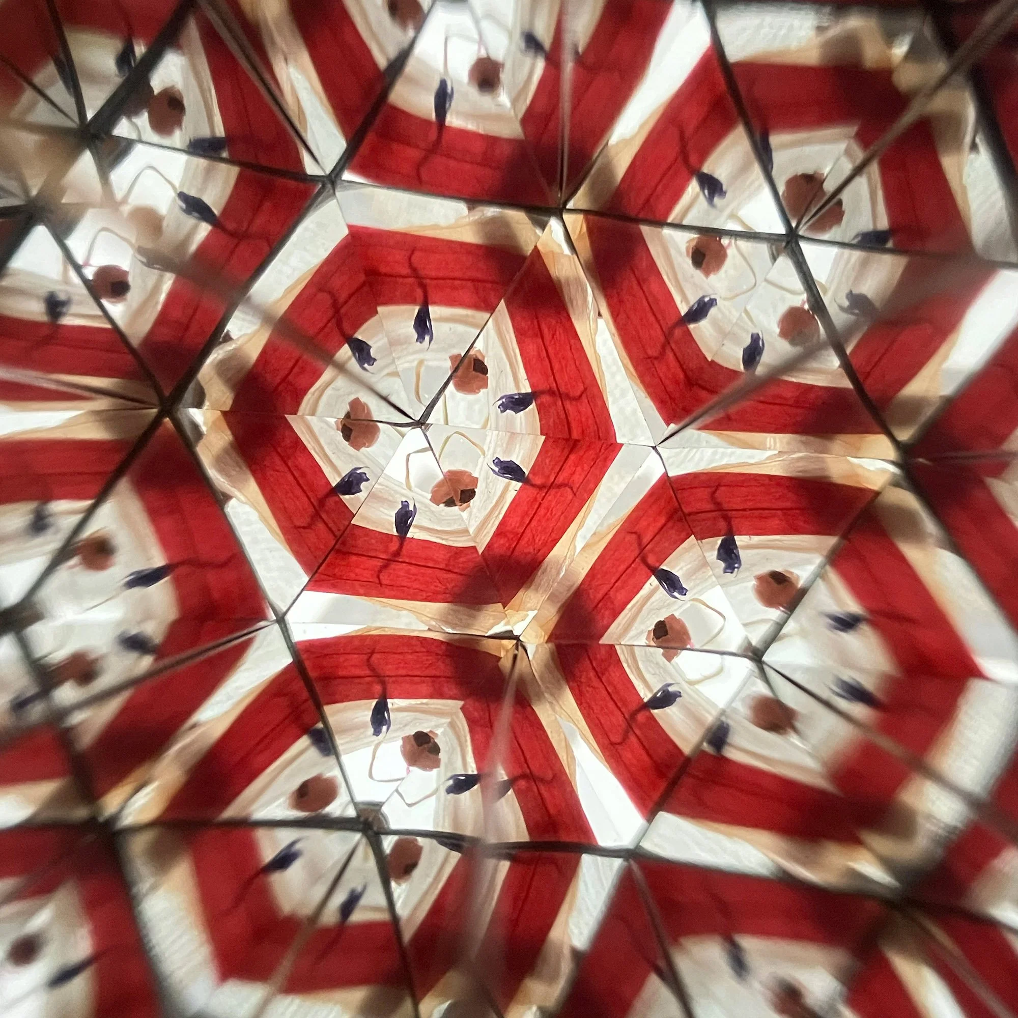  Hexagonal kaleidoscope symmetry featuring rich crimson and gold tones, a modern digital interpretation of natural egg dye textures. 