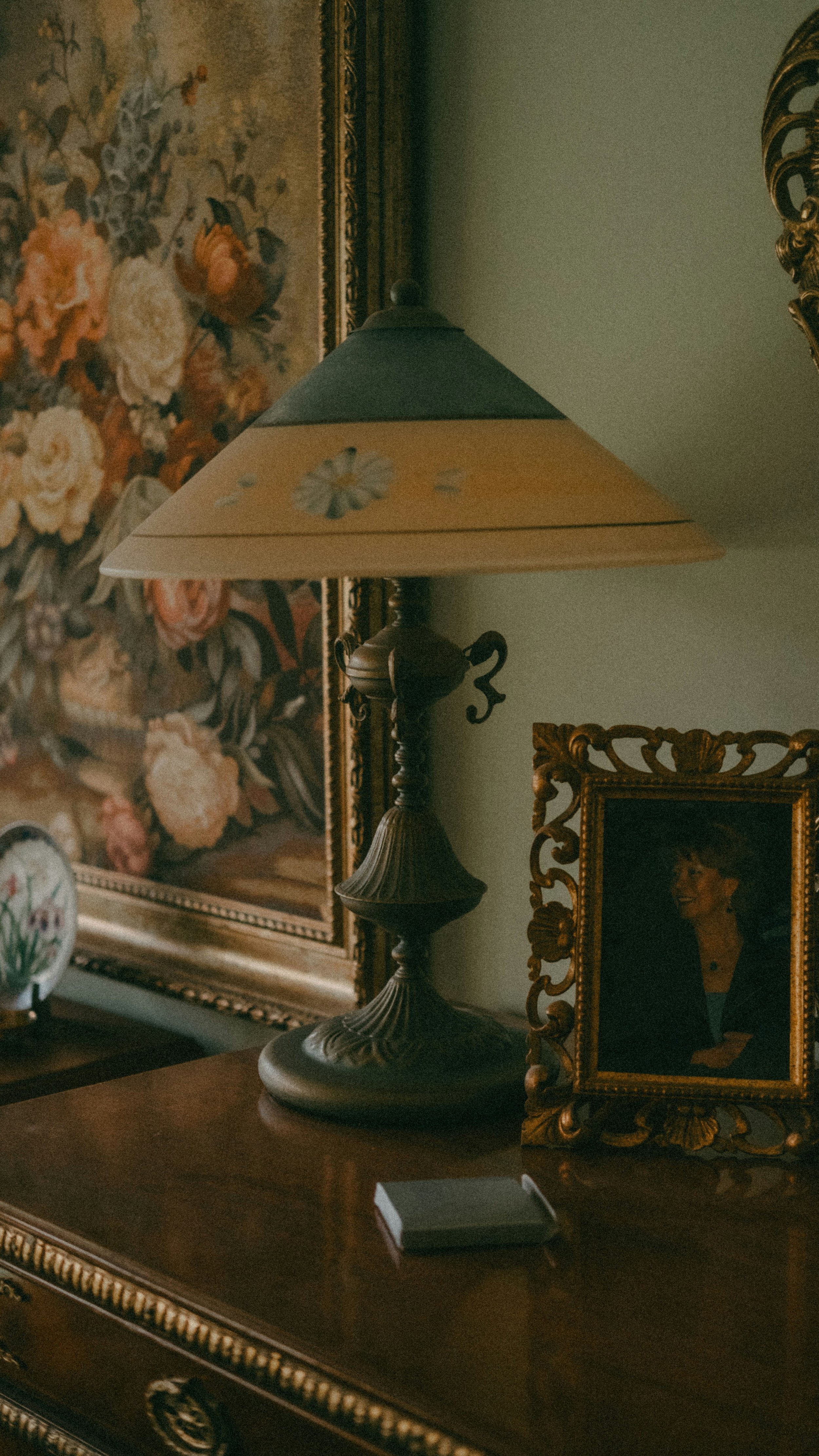 Victorian room with a floral painting and vintage decorations