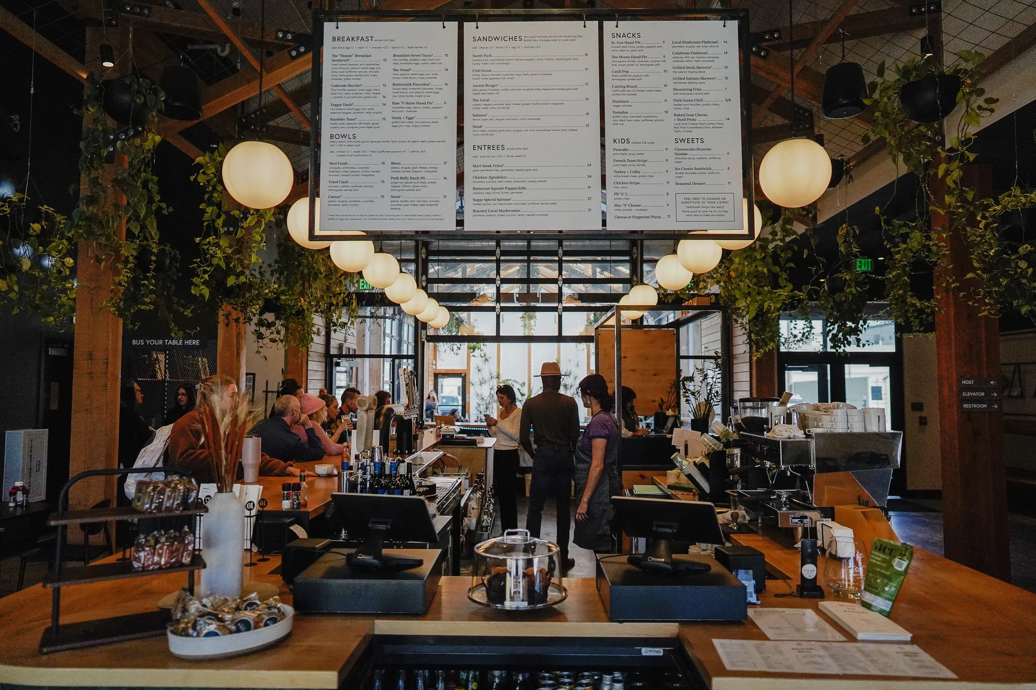 Inside of a restaurant, looking up at menus