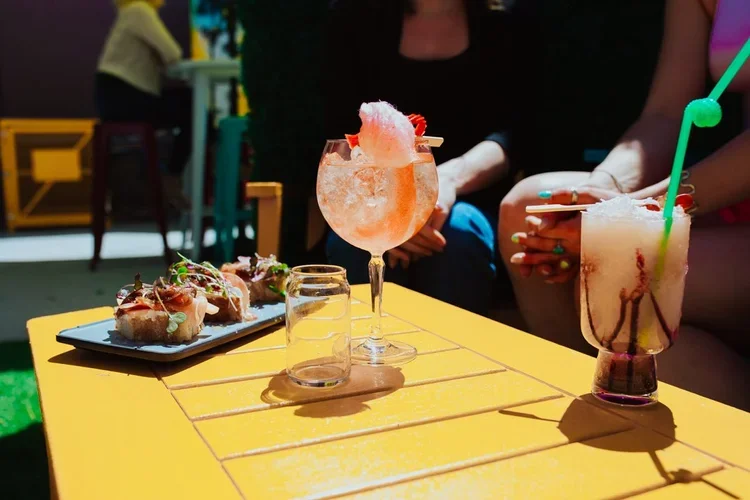 Drinks and apps on colorful table