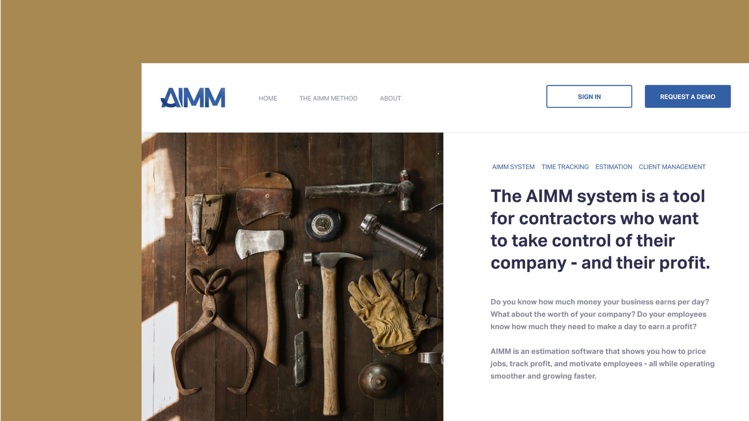 A website page for AIMM featuring a picture of various old tools and gloves on a wooden surface.