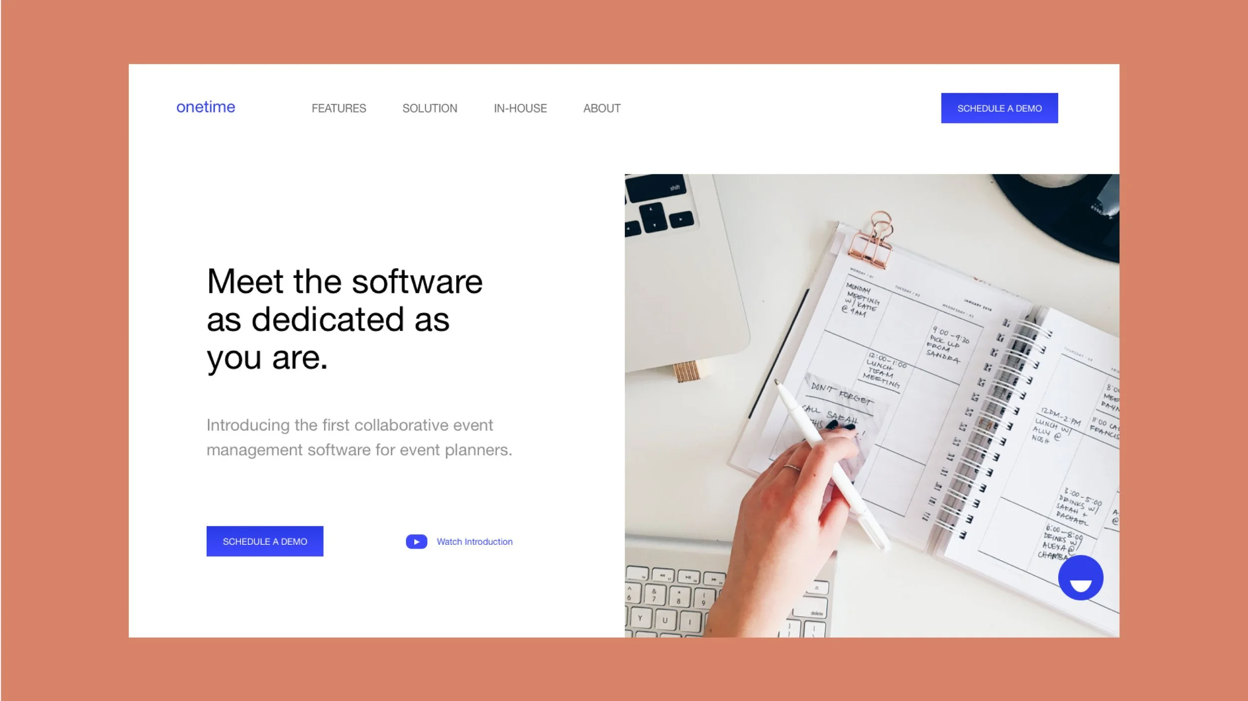 Website homepage with a split layout: left side has text about event management software and blue buttons for scheduling a demo and watching an introduction, right side features a person writing notes in a planner next to a laptop and keyboard.