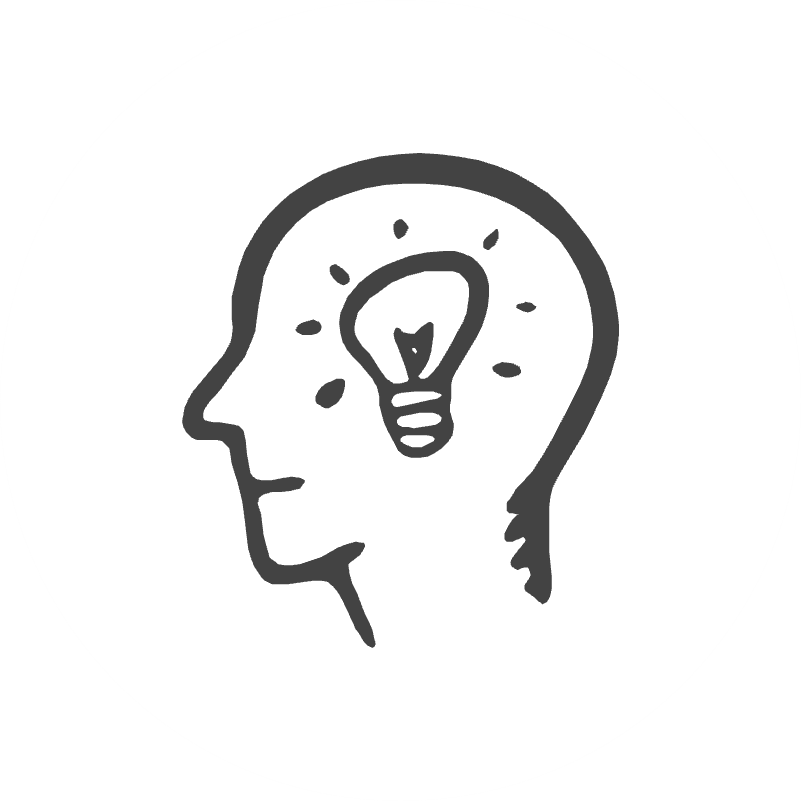 Side profile of a human head with a lightbulb inside representing an idea or creativity.