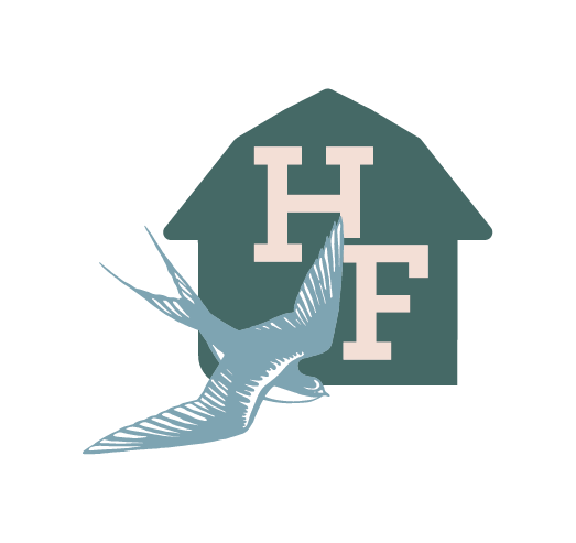 A logo featuring a stylized bird in flight with the letters 'H' and 'F' inside a barn shape.