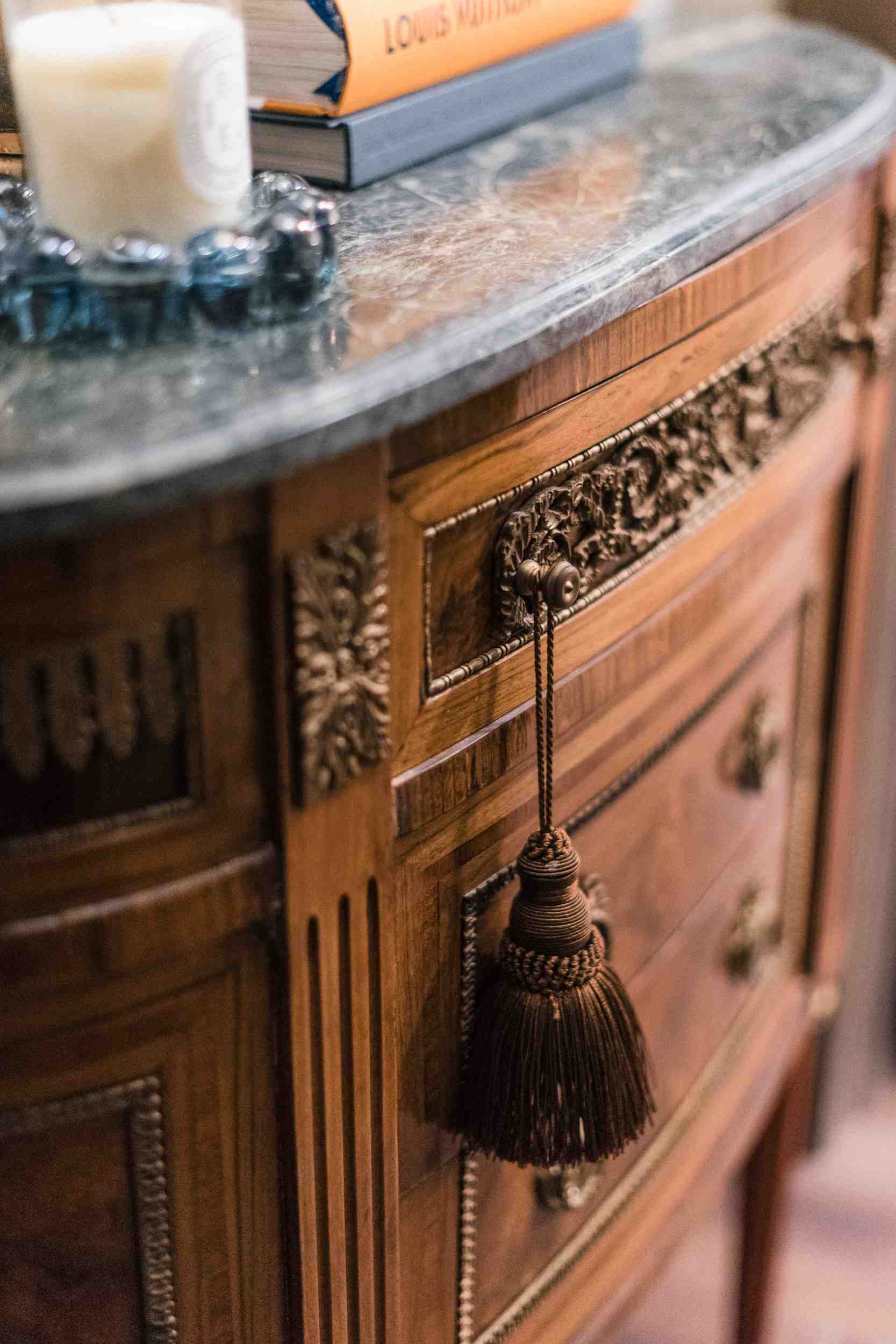Carved wood antique marble-top console
