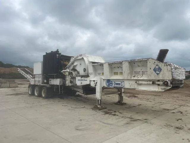 Used Diamond DZH 4000 on a dirt surface under cloudy sky, with extendable components and stabilizers.