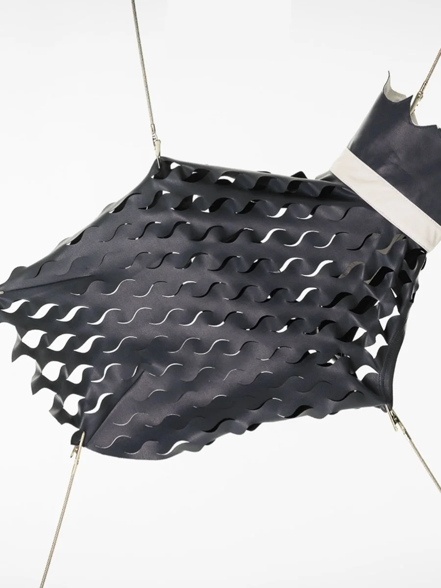 ELASTIC LASER CUTTING VEST.

Precision laser-cut ECONYL&reg; regenerated leather.
Dynamic tension. Multi-layered structure.

A new syntax for dog movement.

[sekai-official.store]