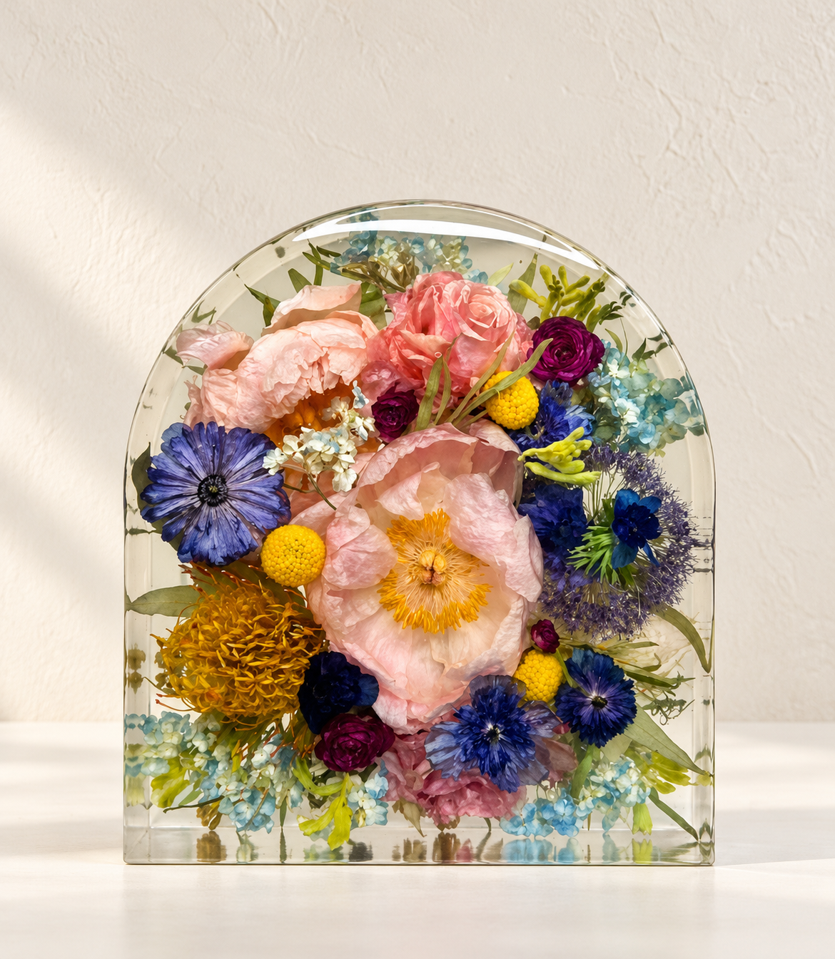 Resin floral arch in soft cream light.png