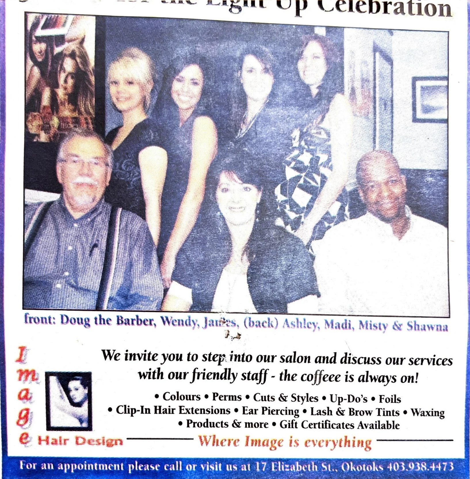 Group photo of six people inside a salon, with some sitting and some standing, promoting hair and beauty services.