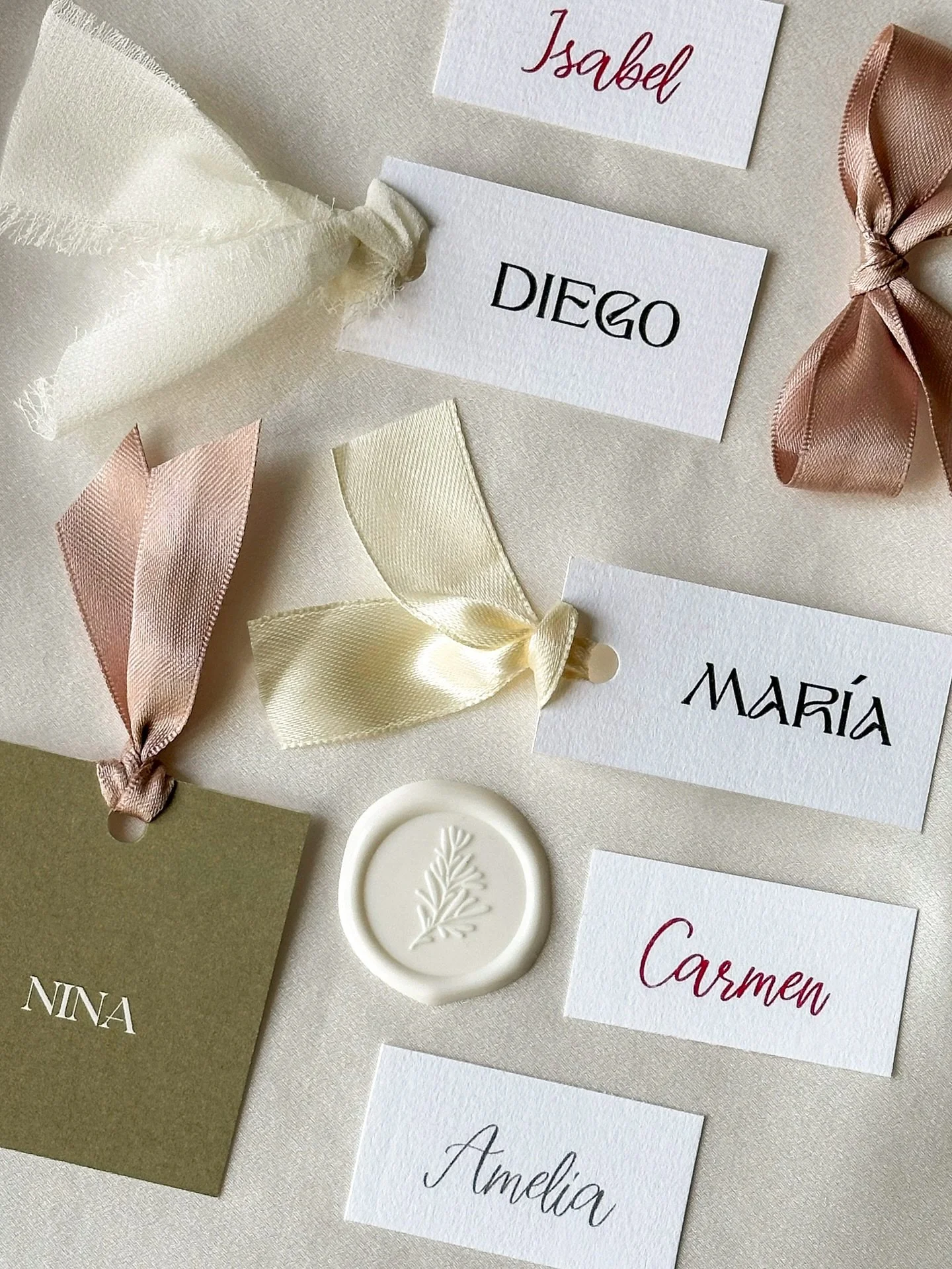 ✻ Wedding stationery speaks before words do.

And place cards &mdash; so small, yet so powerful &mdash; guide guests gently to their place at the table.

With hundreds of possibilities to choose from, for this wedding we embraced less:
minimalist des