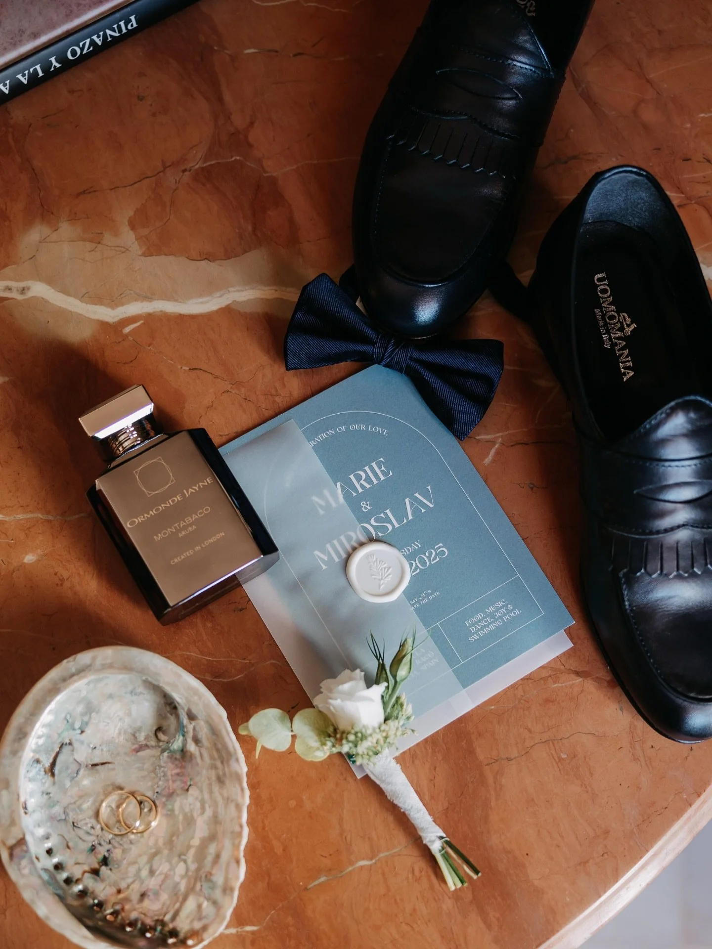 ❋ The quiet moments before &ldquo;I do.&rdquo; Polished shoes, a favorite fragrance, the rings waiting patiently &mdash; and the invitation that started it all.

It&rsquo;s these personal details that make every wedding so special. Each couple brings