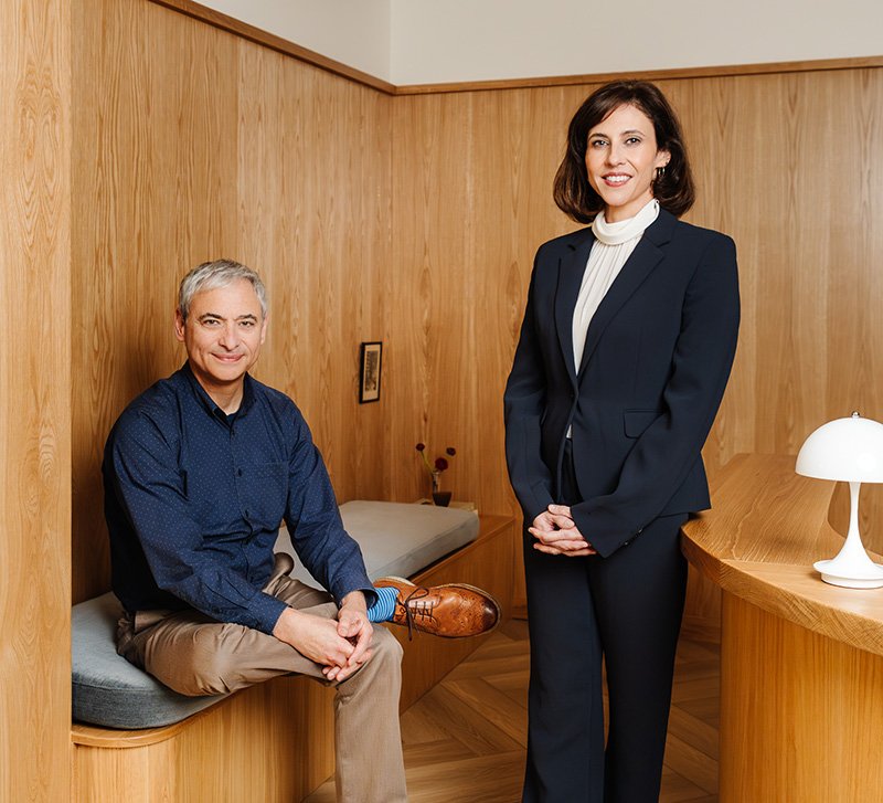 A photo showing Dr. Fuchs and Dr. Meszaros in the reception area for Wilshire Internal Medicine.