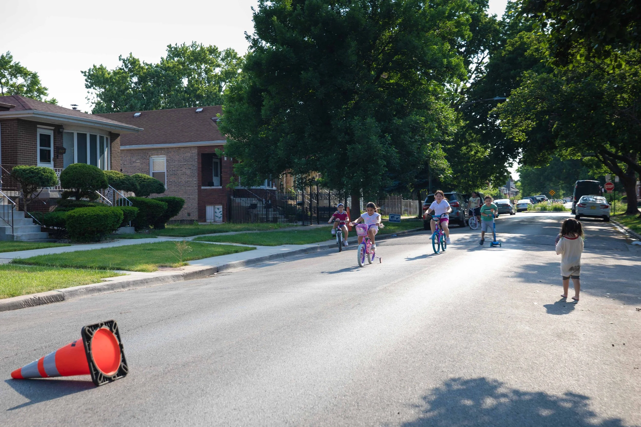 
Children ride down 61st Street near Hamlin Avenue during a neighborhood block party in the West Lawn neighborhood. West Lawn is a neighborhood on the Southwest Side of Chicago. This photo is part of the Columbia Chronicle’s “77 Community Areas” proj