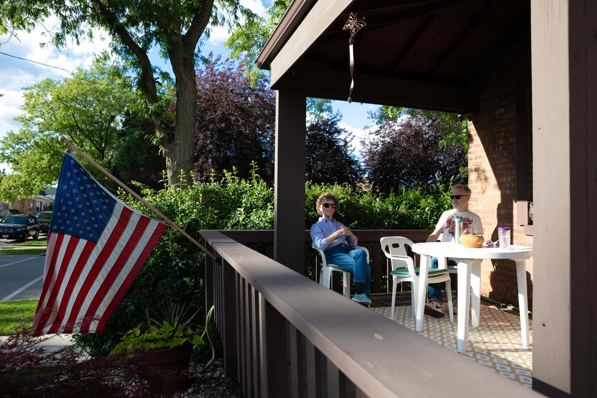 Daniel Derdzimski, a Columbia alumni, sits on the front porch with his mother, Gloria Derdzimski, at her Garfield Ridge home in Chicago, where she has lived since 1956. This photo is part of The Columbia Chronicle’s “77 Community Areas” project docum