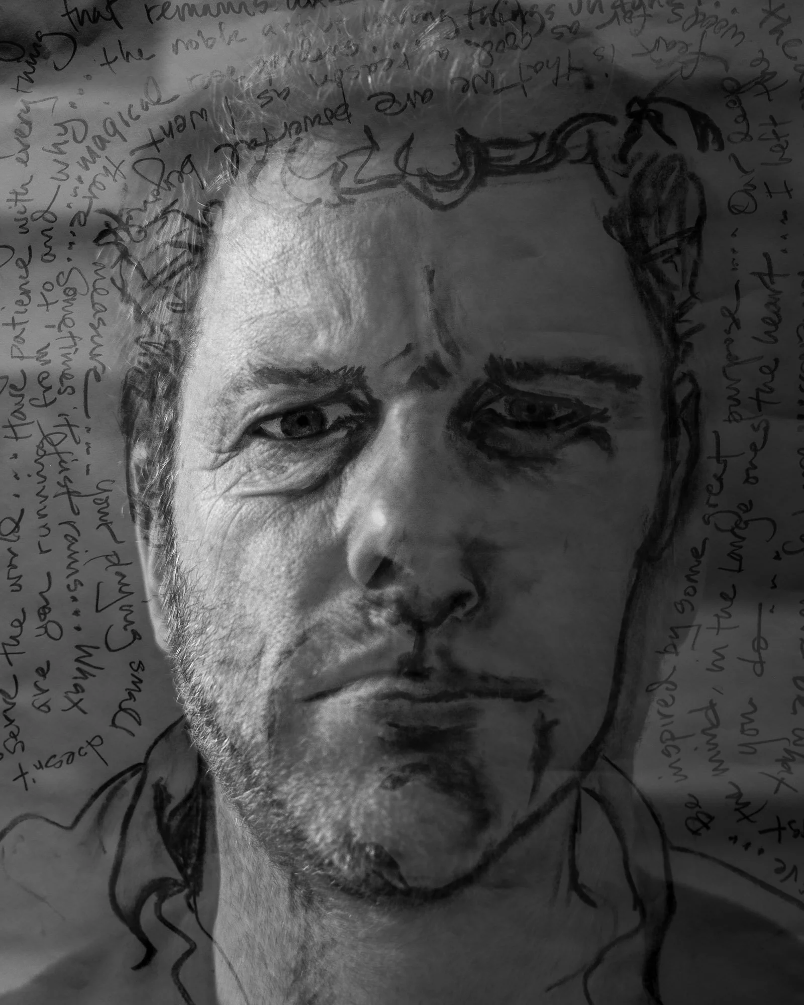 A mixed media artwork combining a realistic black-and-white portrait of a man with handwritten text surrounding the image, blending drawing and writing.