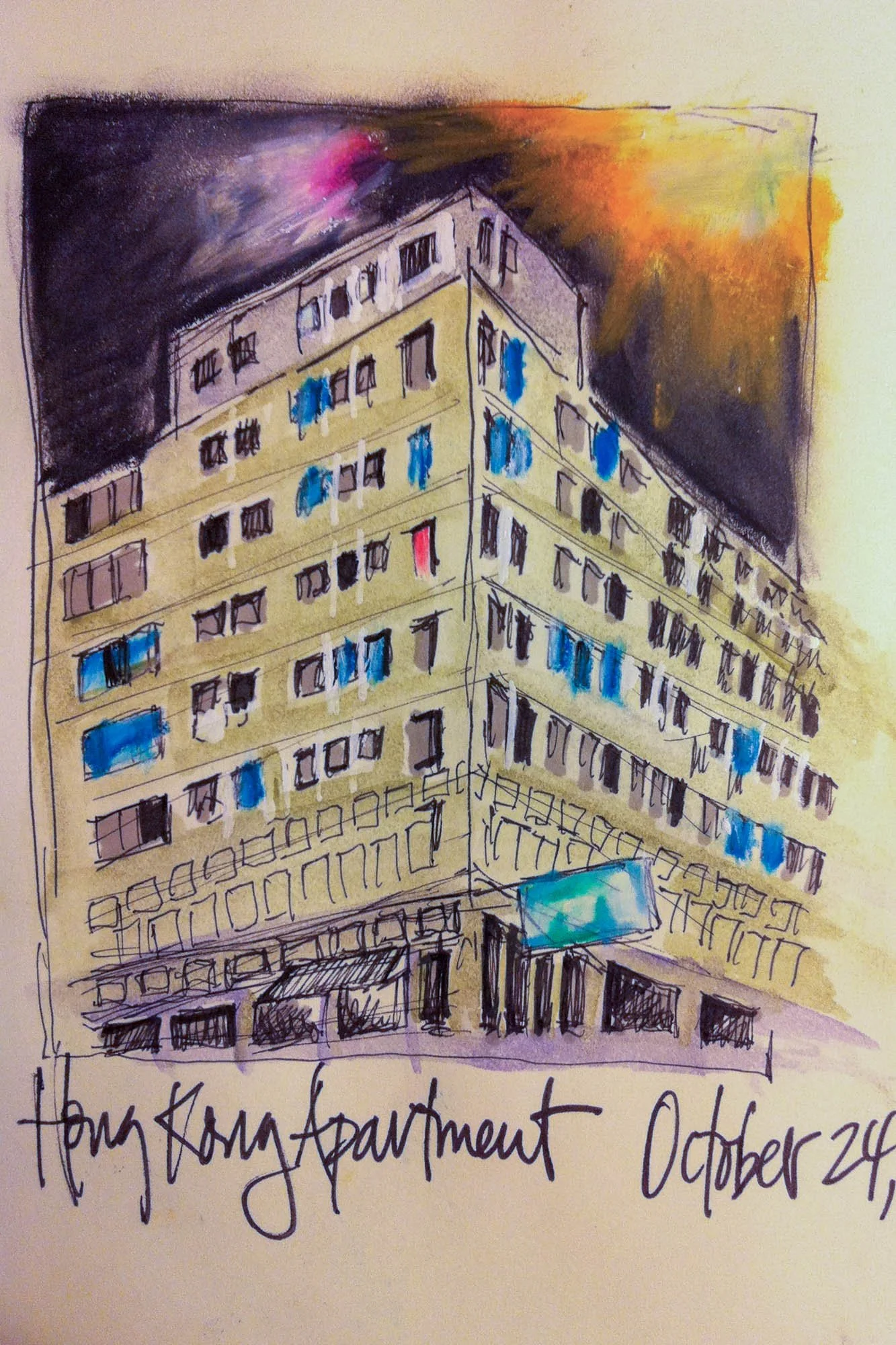 A colorful sketch of a high-rise building with many windows and laundry hanging outside, under a dark and orange sky. Handwritten text at the bottom reads "Kong Apartments October 24."