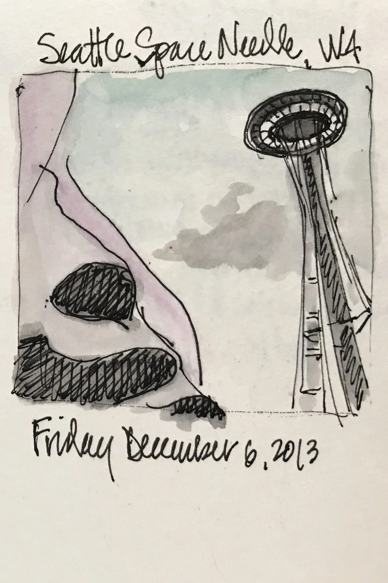 A sketch of the Seattle Space Needle with handwritten notes, including the date December 6, 2013, and a note about Seattle.