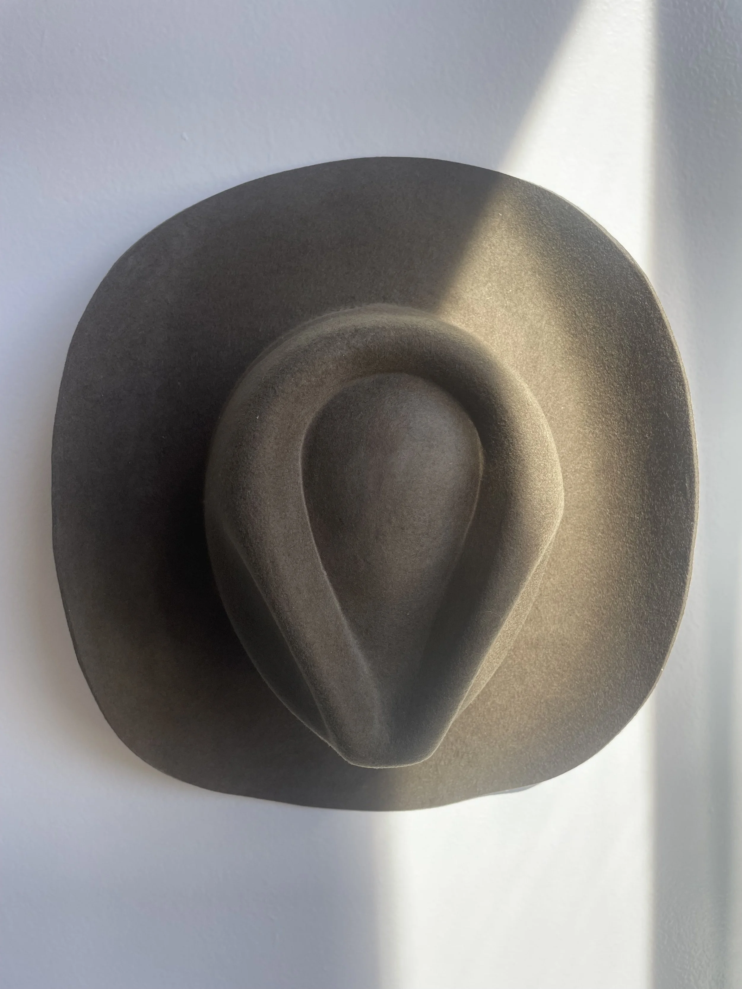 pinch front cowboy hat in olive green