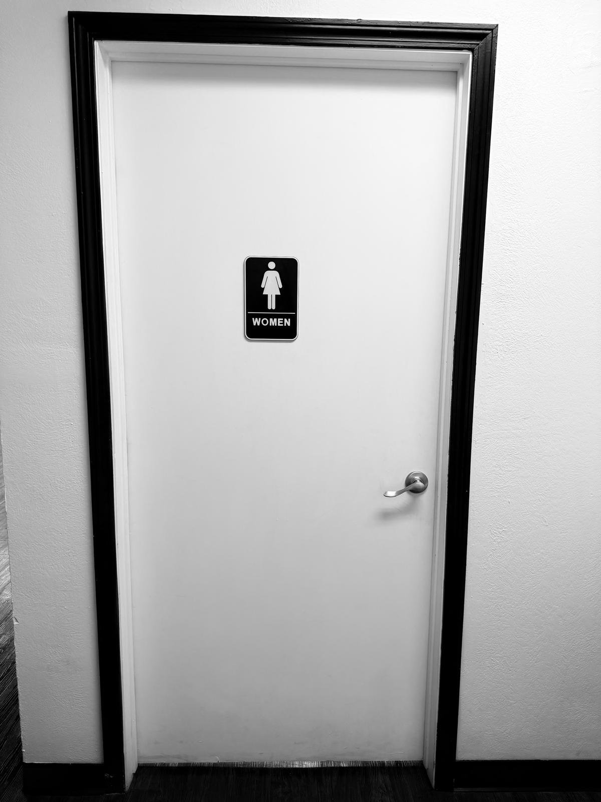 The women’s restroom features two well-appointed toilets, ensuring comfort and convenience for your guests.