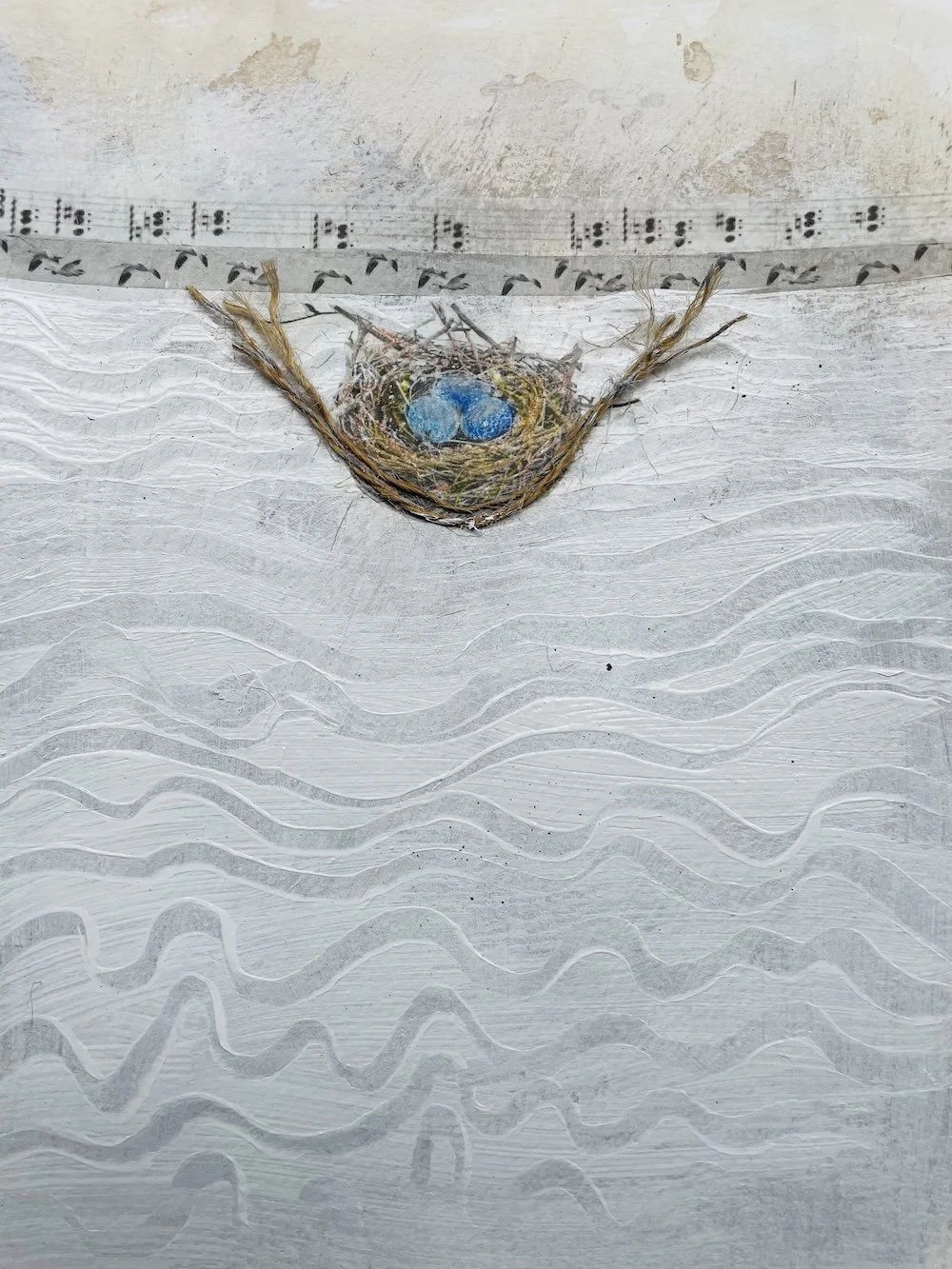  NEST IN THE STREAM                                                     
mixed media
 16"H x 12"W
 2025
