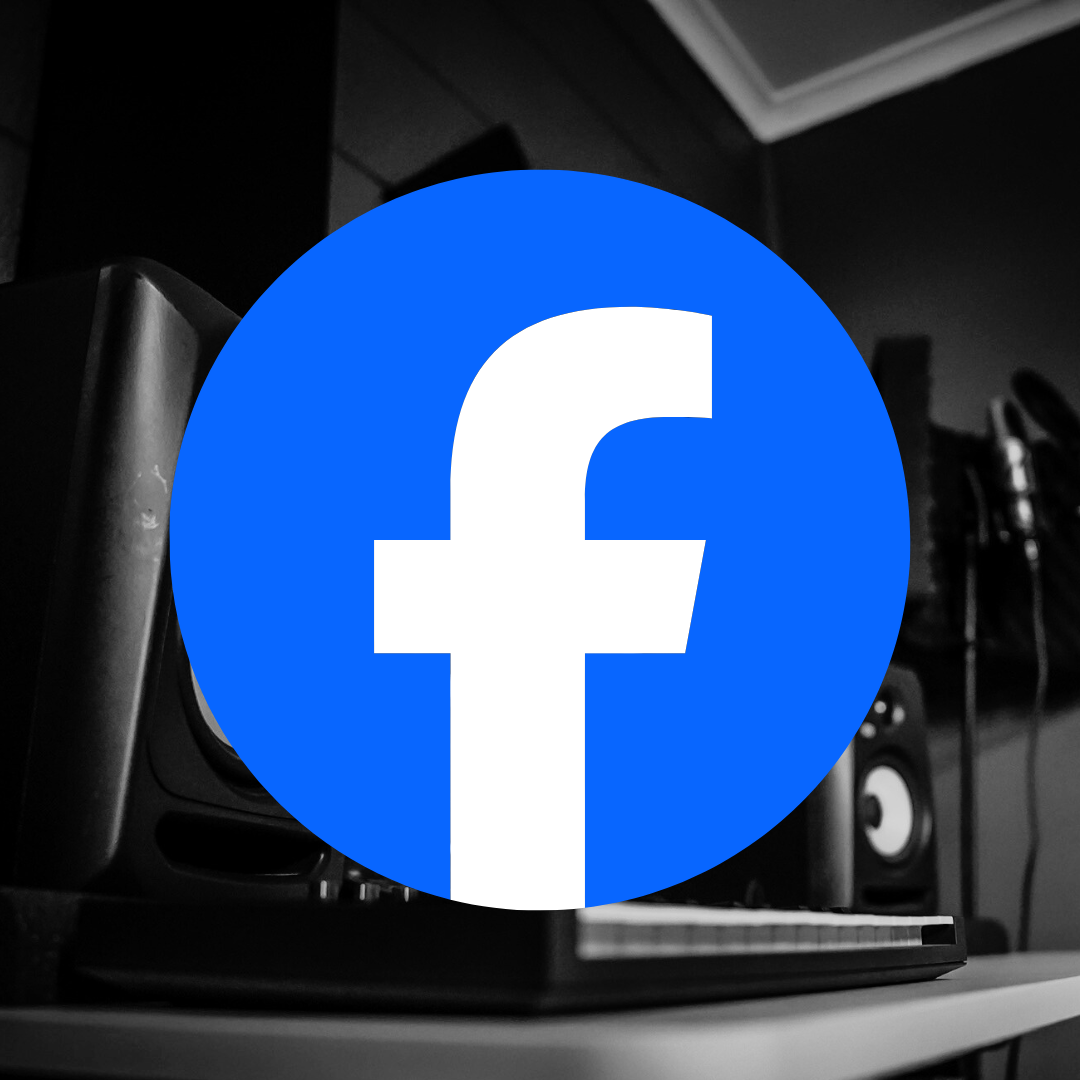 Facebook logo superimposed over a black-and-white image of a music studio with speakers and a keyboard.