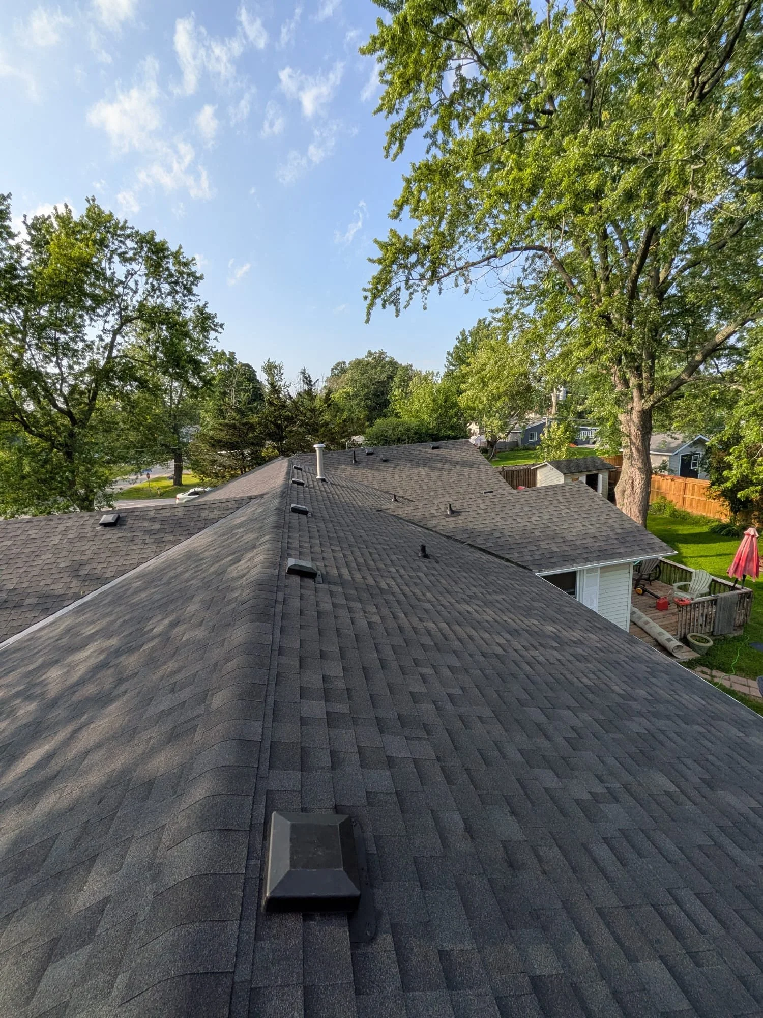 Full roof replacement above a backyard deck in St. Catharines