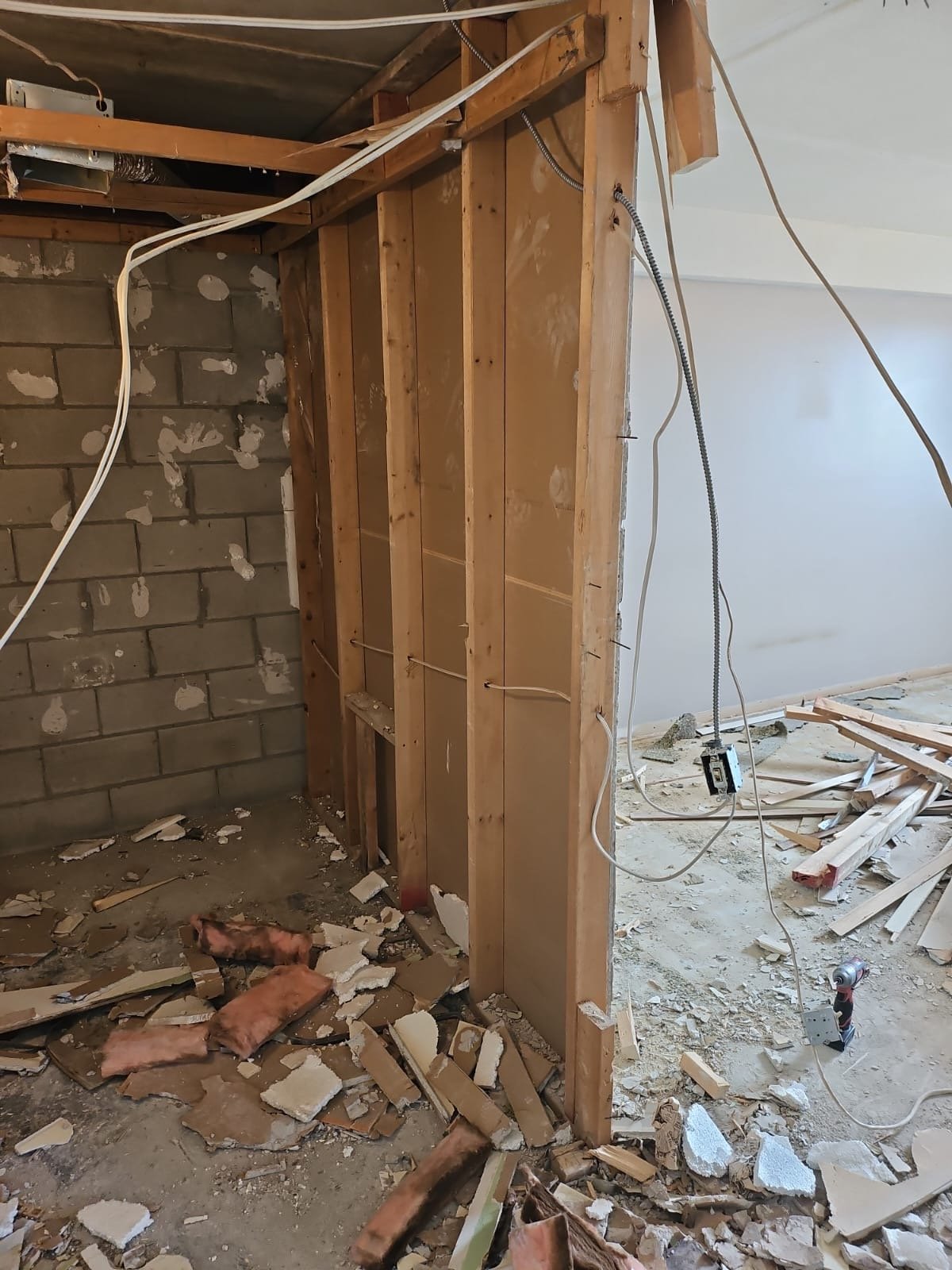 Framing and electrical rough-in during a basement renovation in Welland