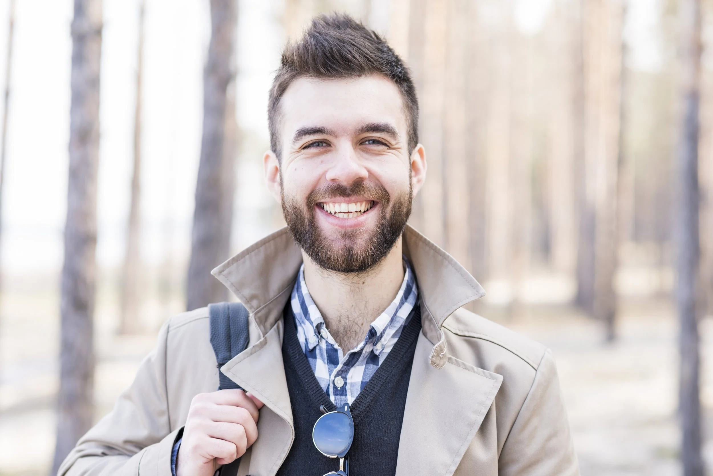 portrait-smiling-young-man-looking-camera.jpg