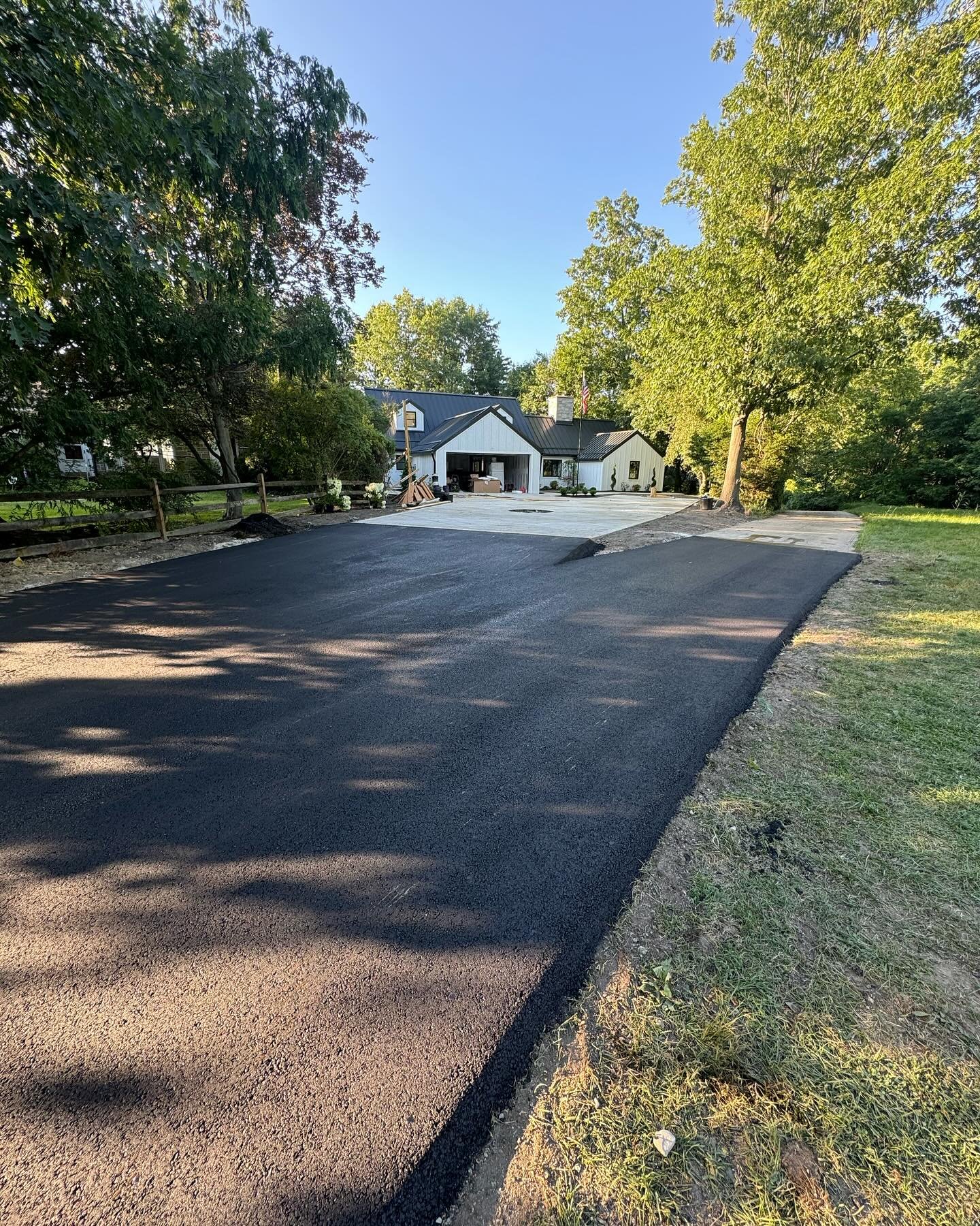 Beautiful combo next to this cool pattern concrete driveway (concrete was not done buy us).