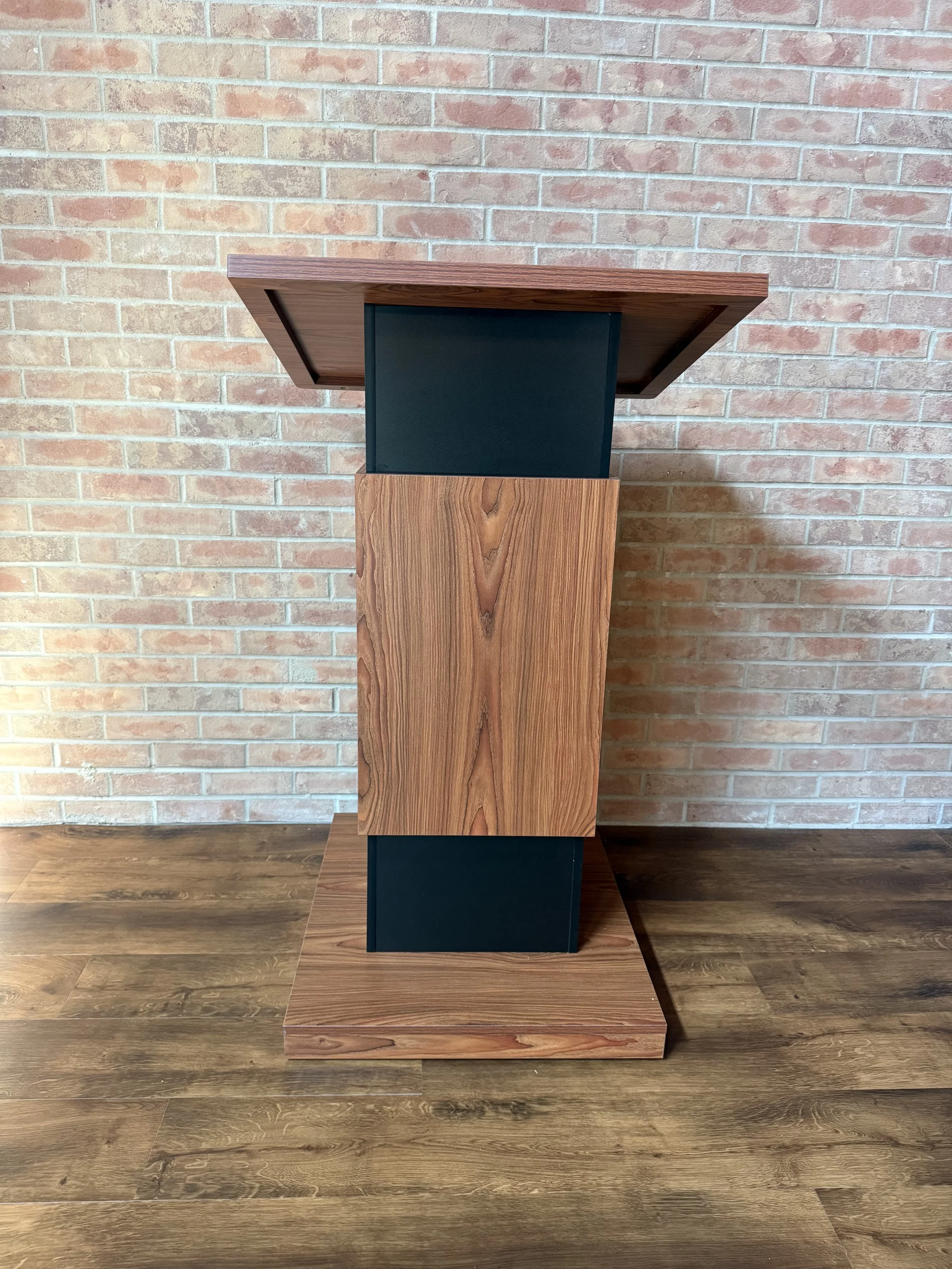Podium with microphone and speakers througout the space are available for use