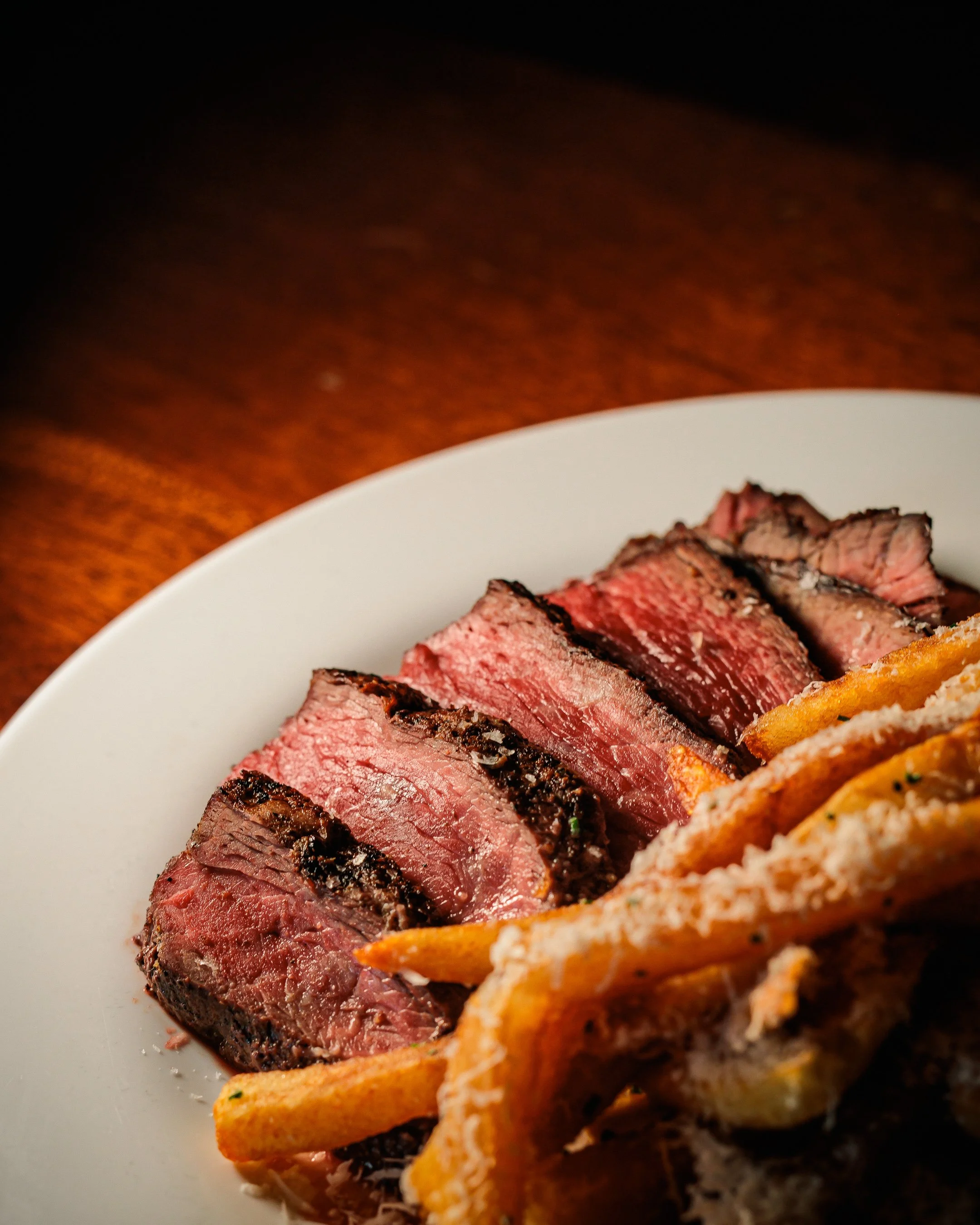 Steak frites at Tavern Law, seared steak with fries on the current dinner menu in Seattle