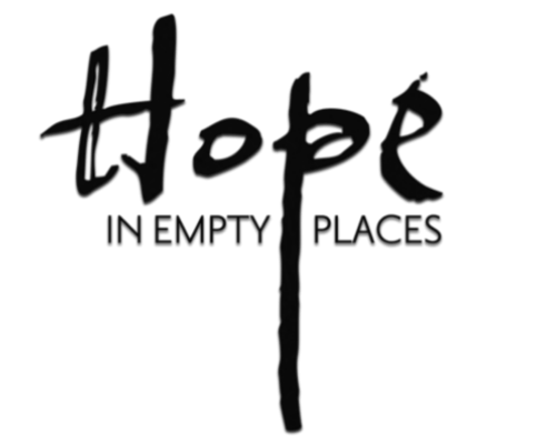 Logo with the word 'Hobé' and the tagline 'In Empty Places' underneath.