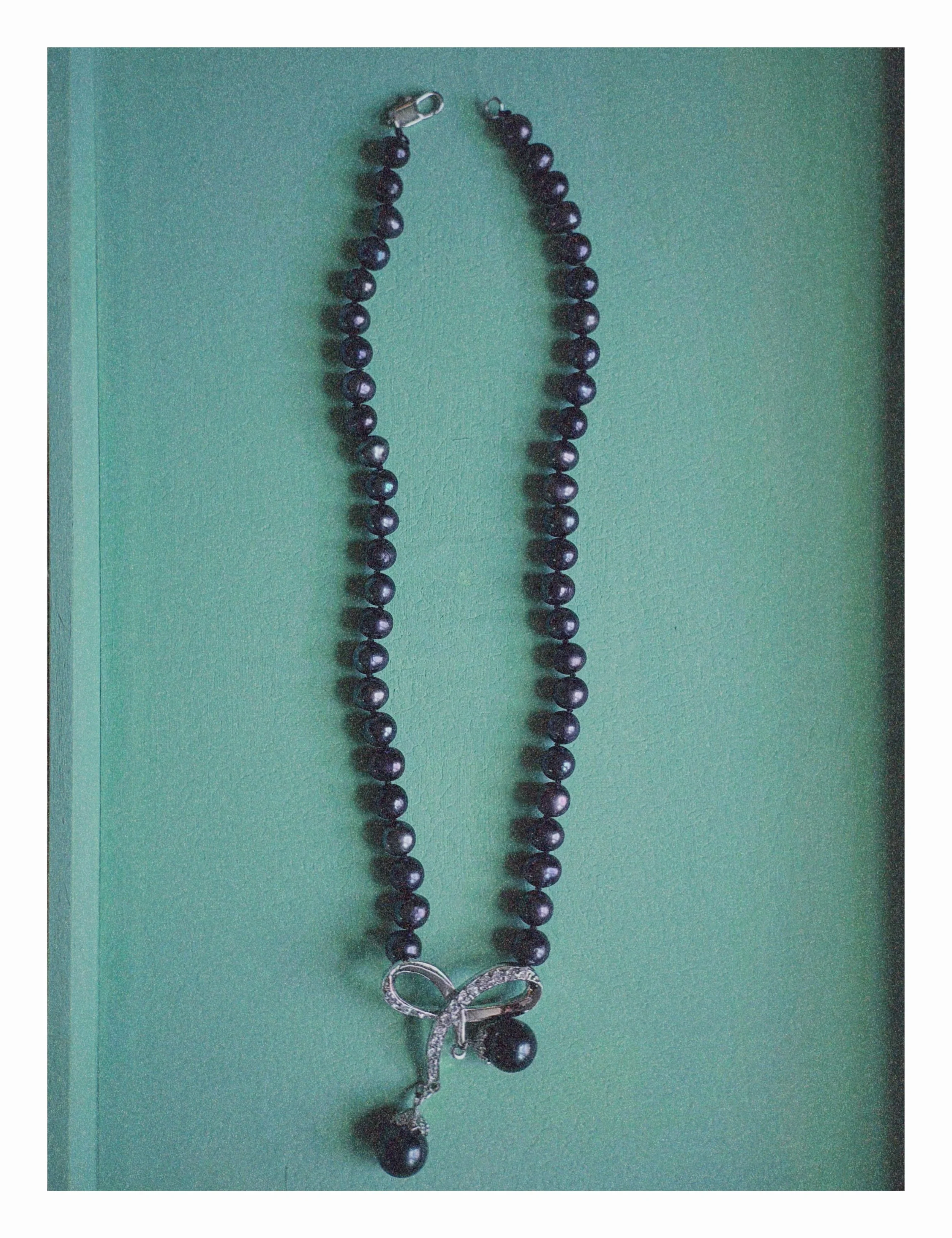 Dark Baroque Pearl Necklace With Pavé Bow & Pearl Drops
