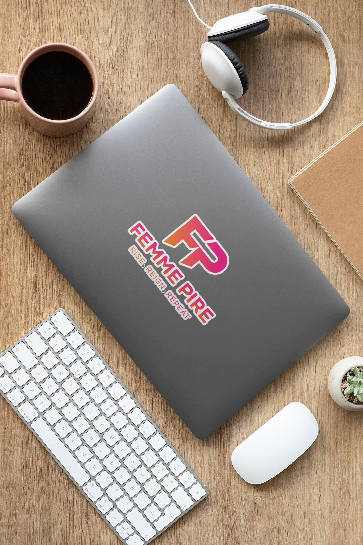 sticker-mockup-featuring-a-laptop-on-a-wooden-desk-33602.png