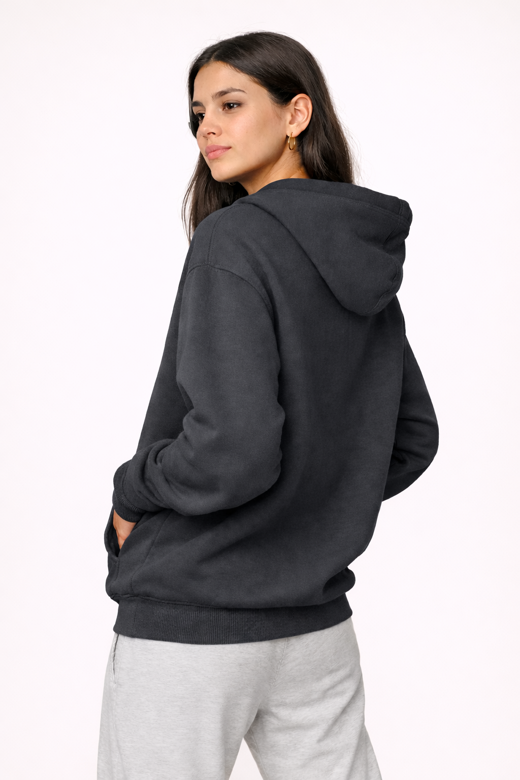 Model in charcoal gray hoodie portrait.png